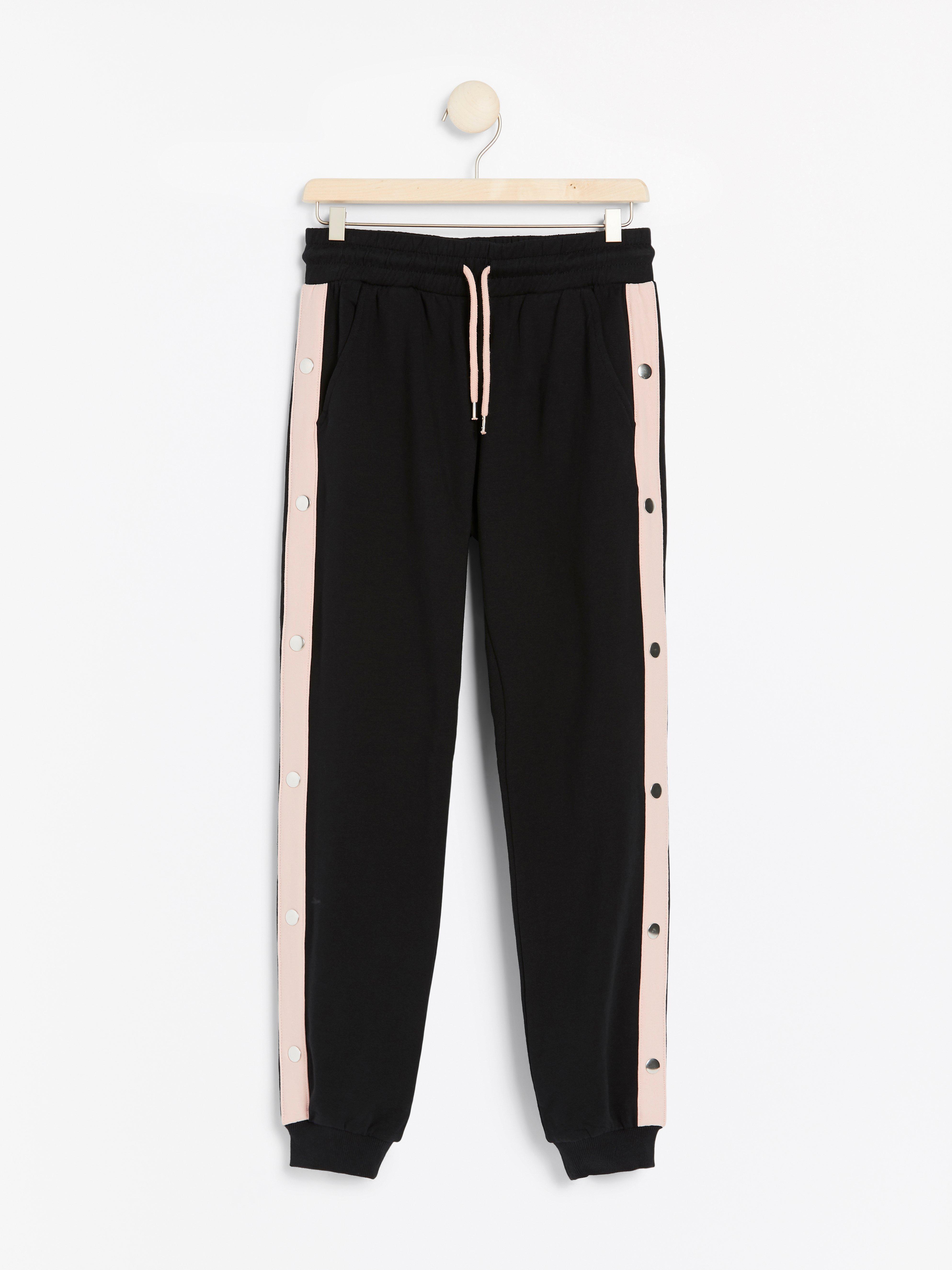 sweatpants with buttons on the side