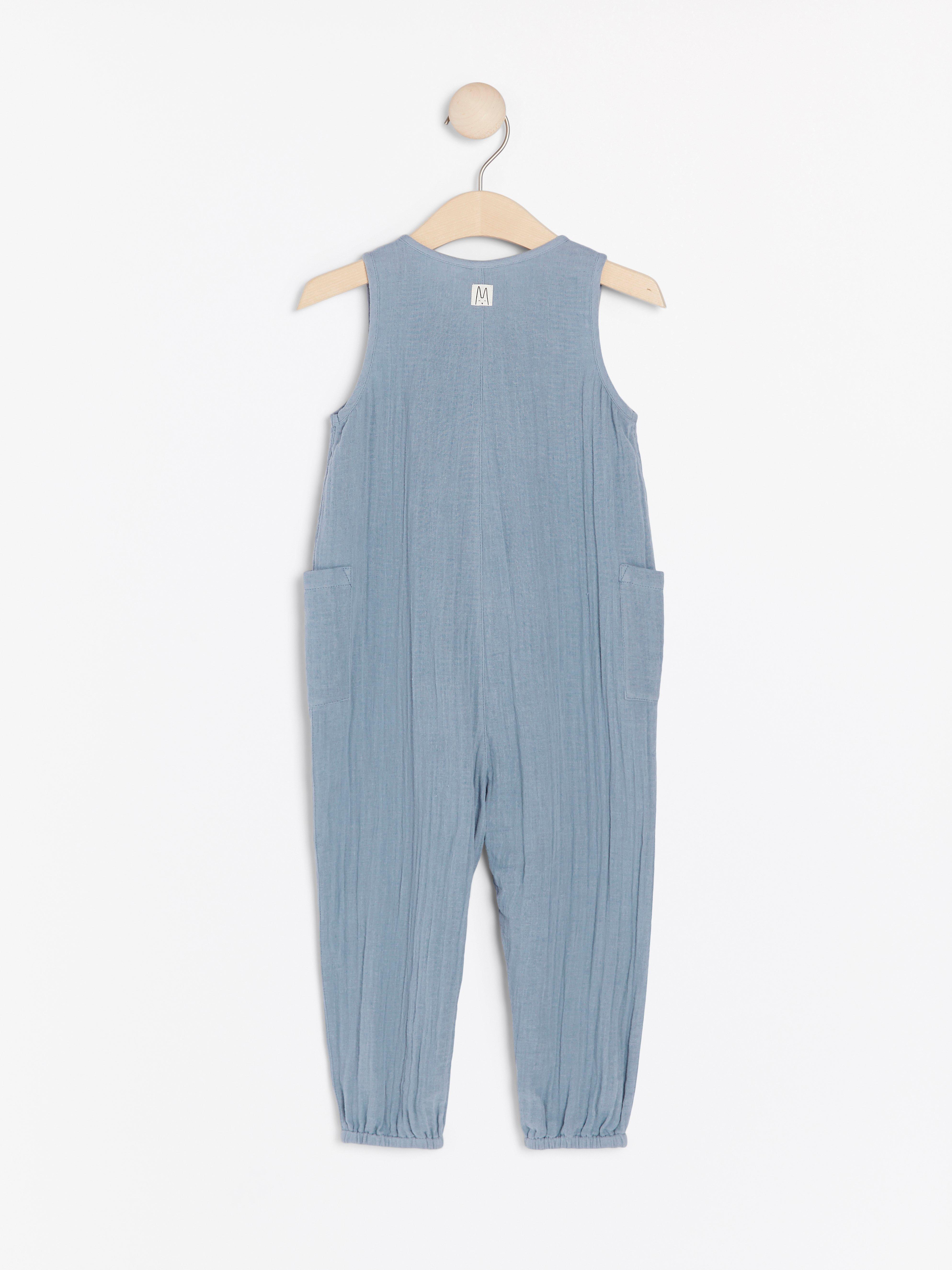 blue sleeveless jumpsuit