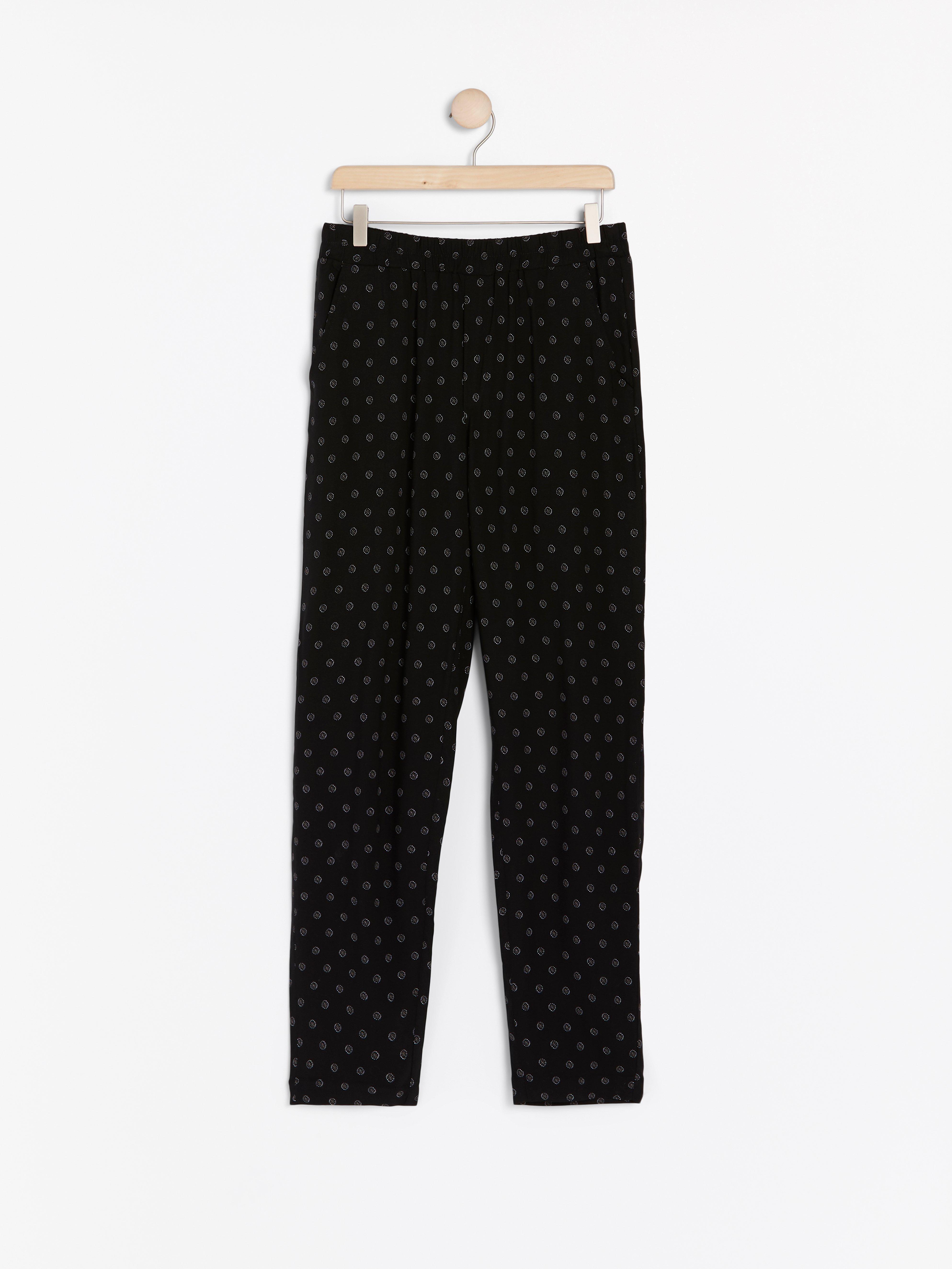 patterned tapered trousers
