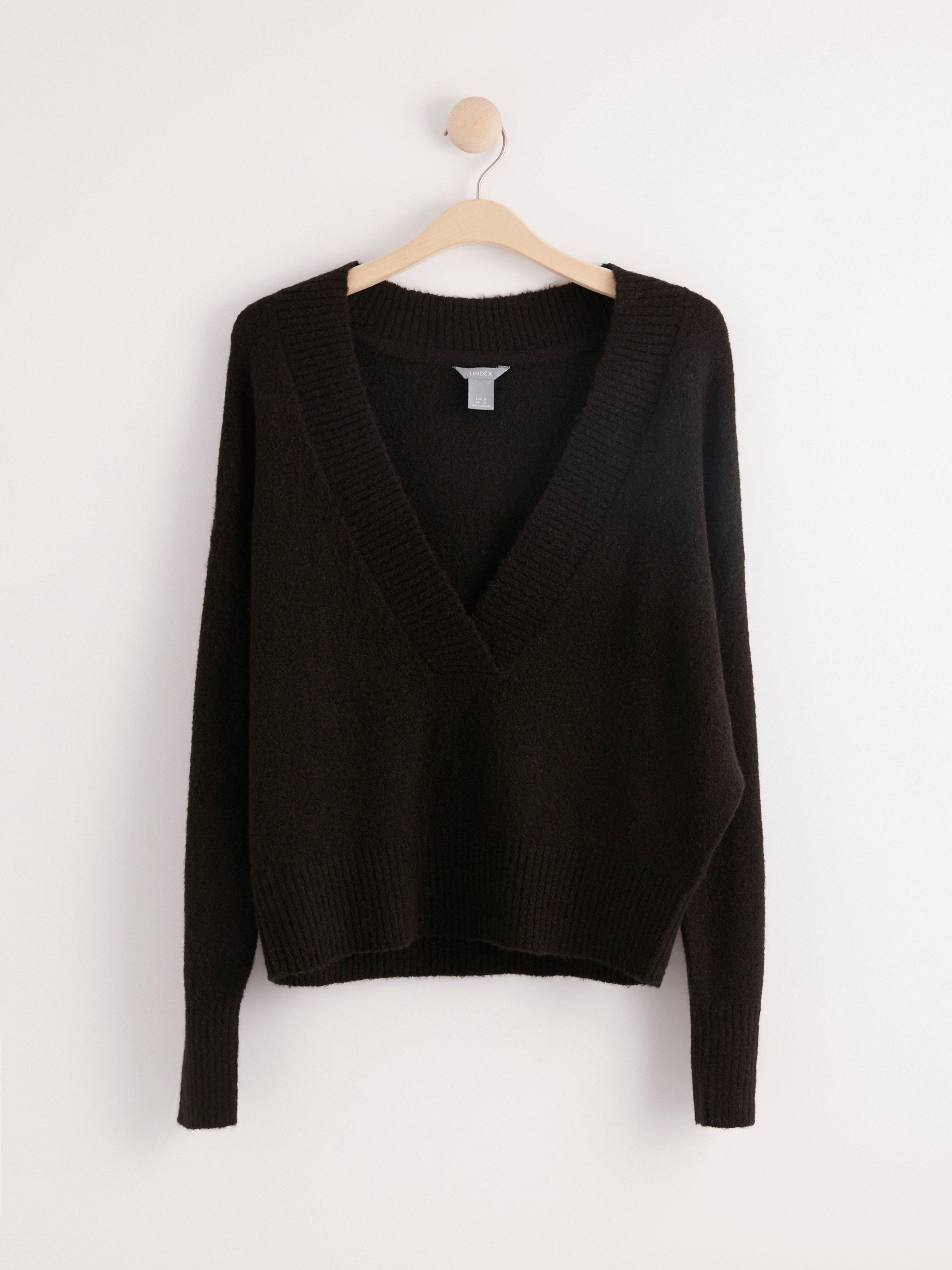 black knitted v neck jumper