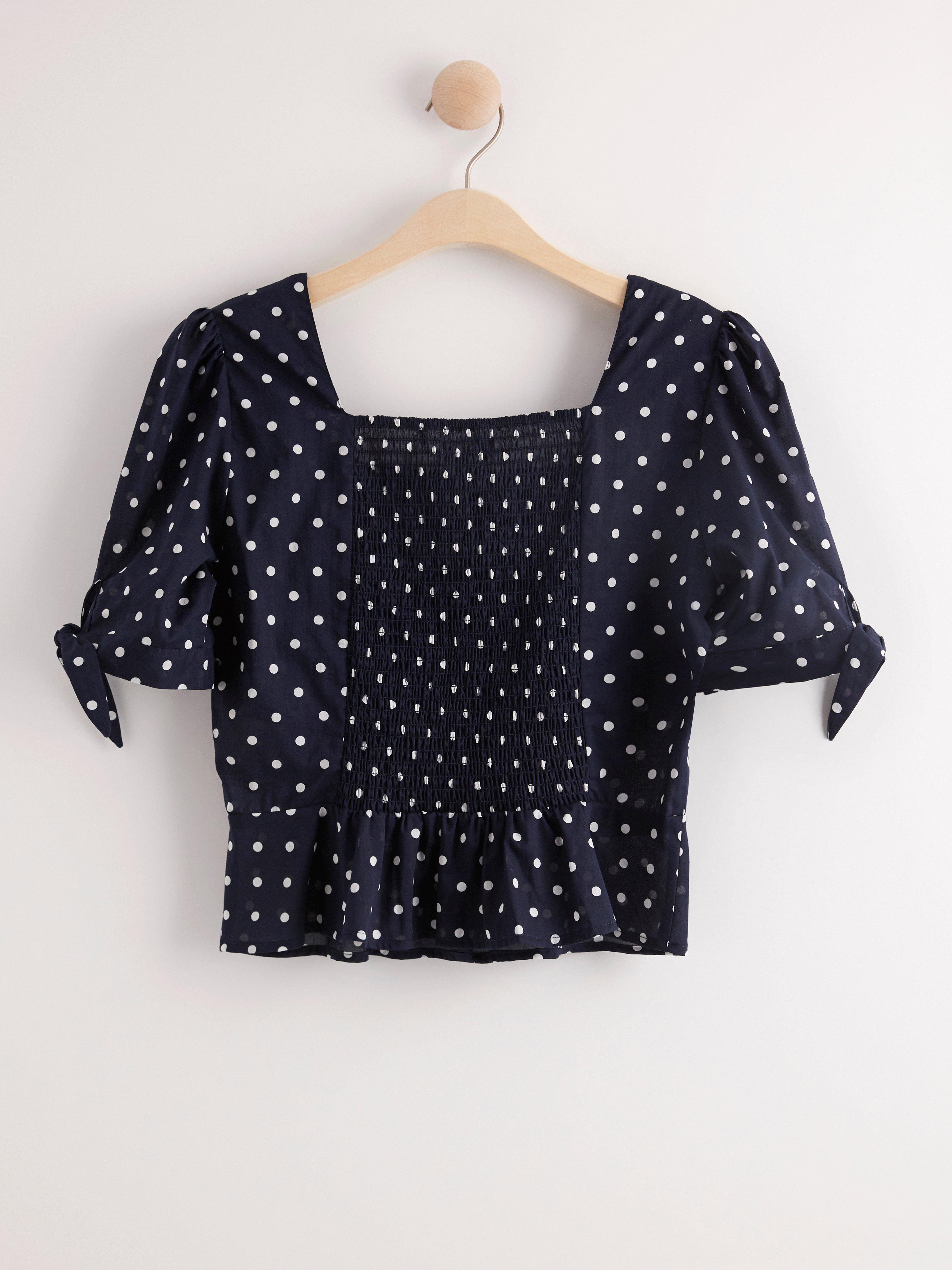 polka dot puff sleeve blouse