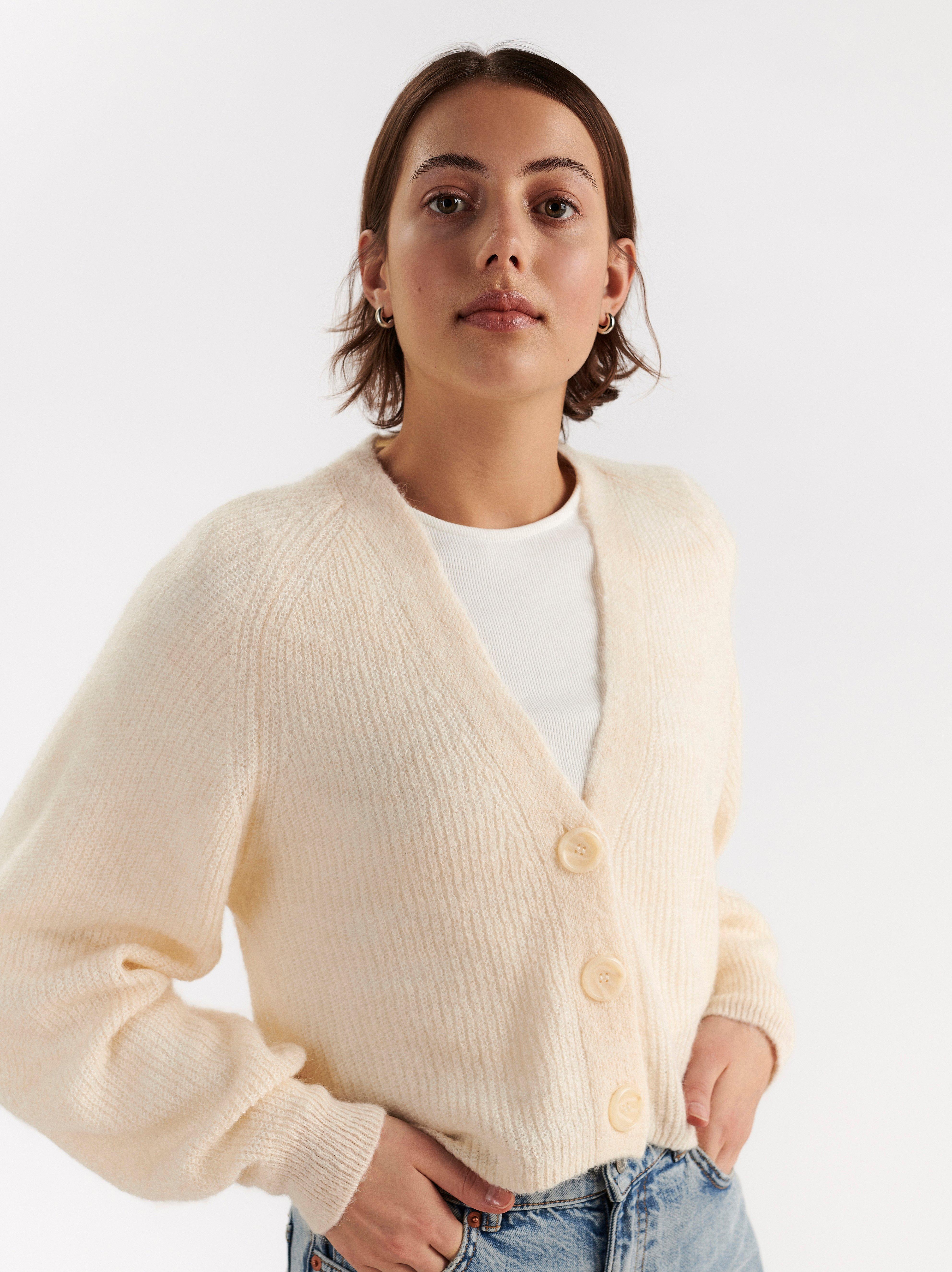 long white knitted cardigan