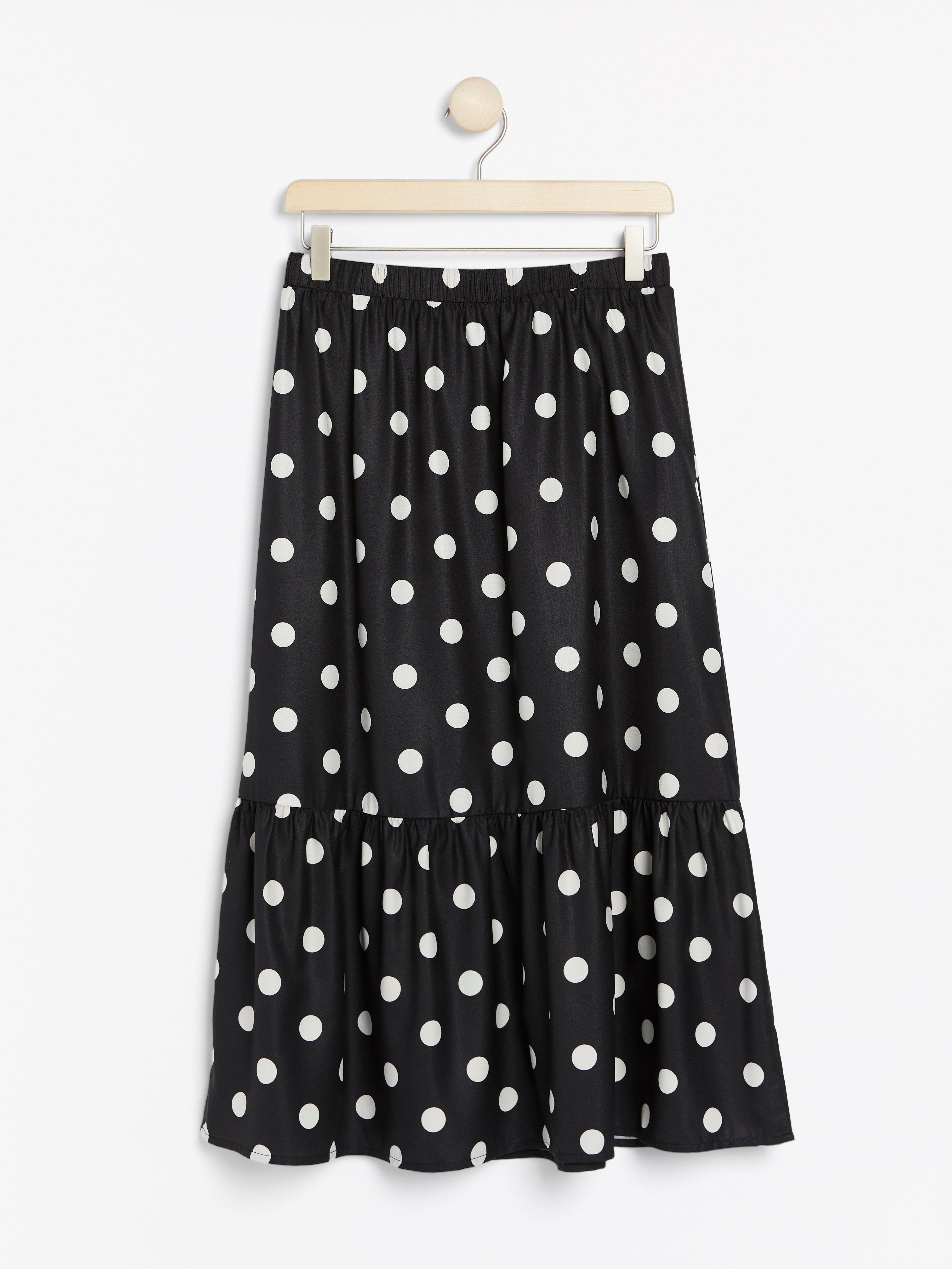 black skirt with white dots