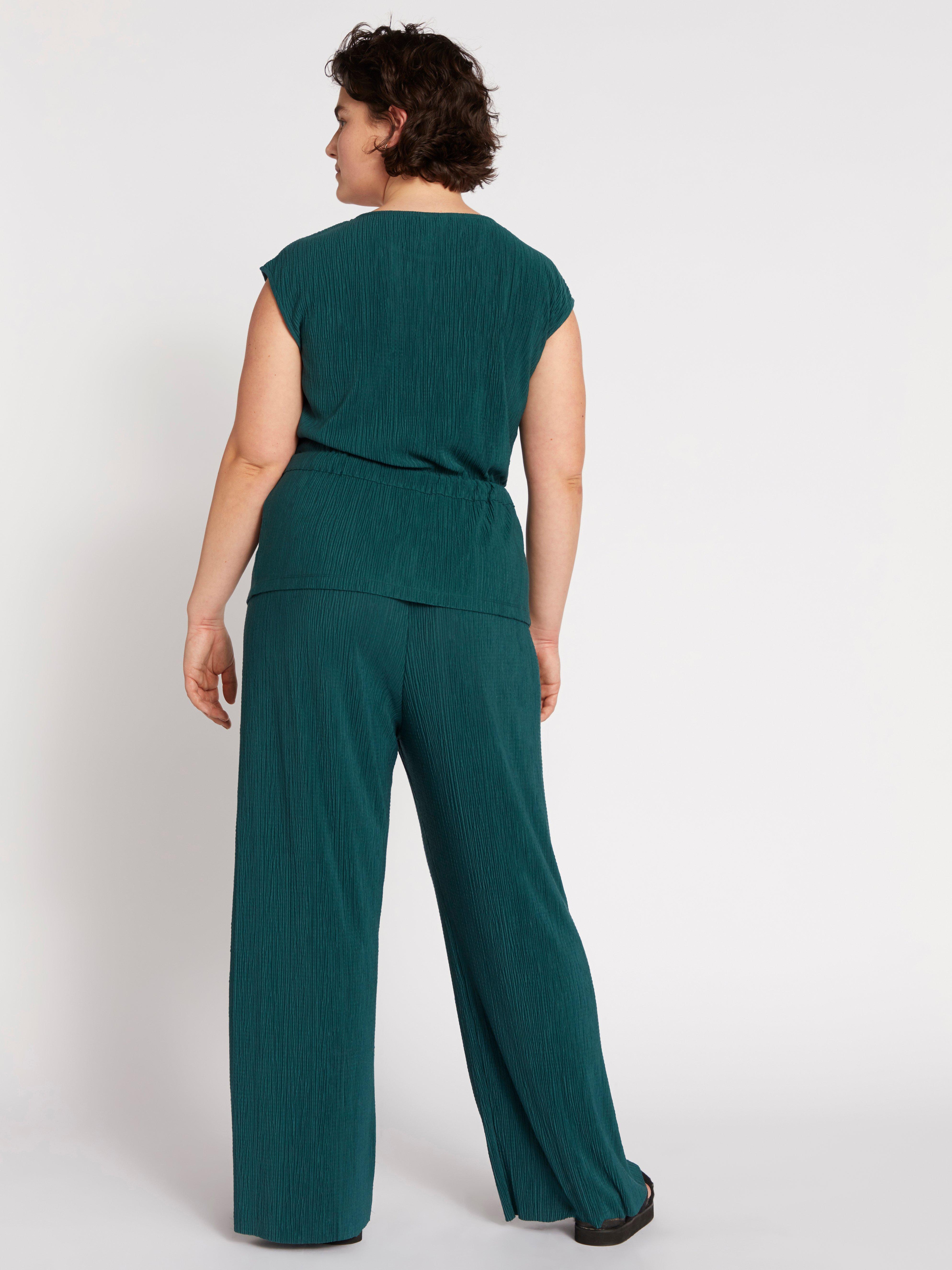 high waisted pleated trousers