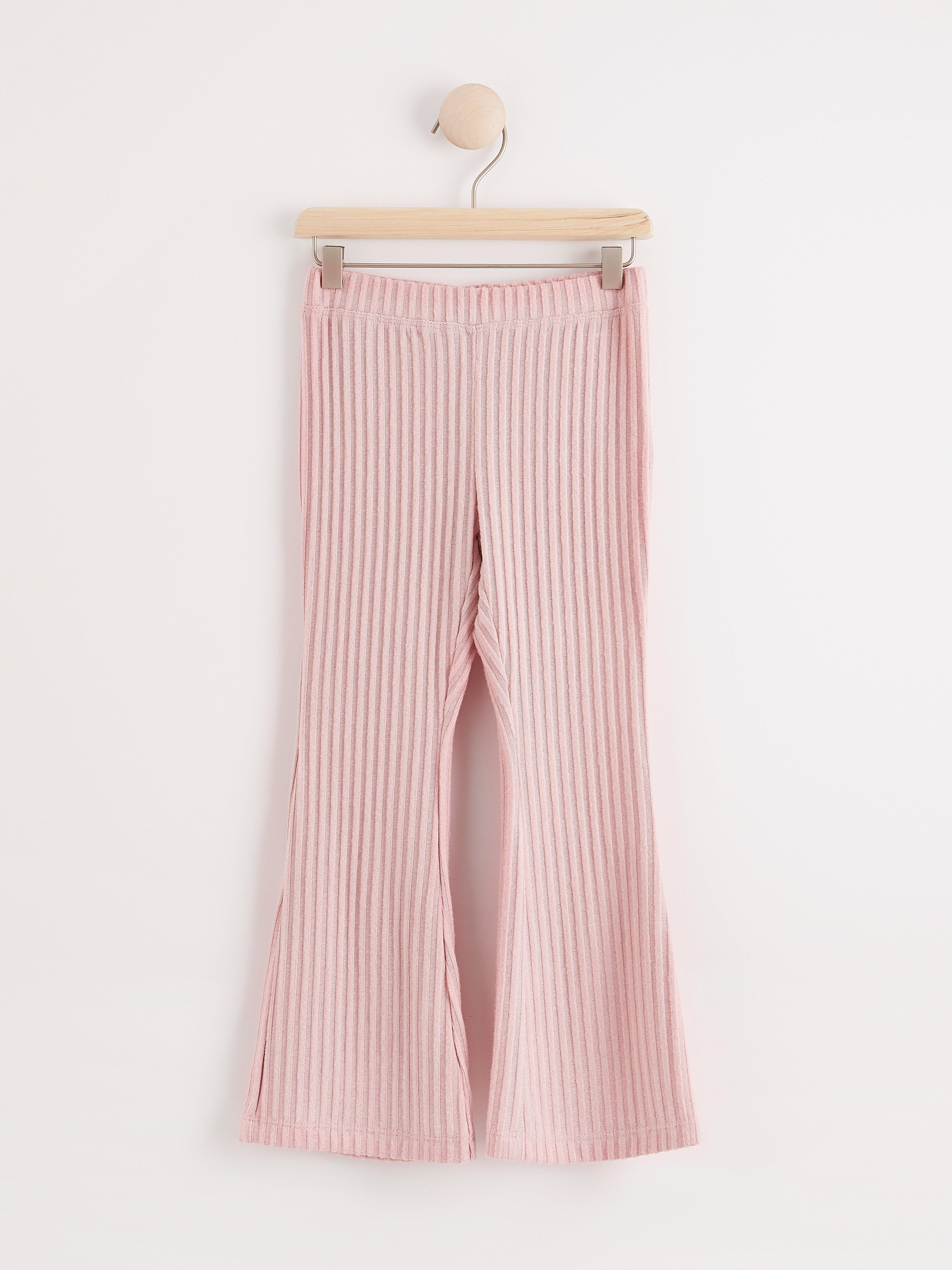 flared pink trousers
