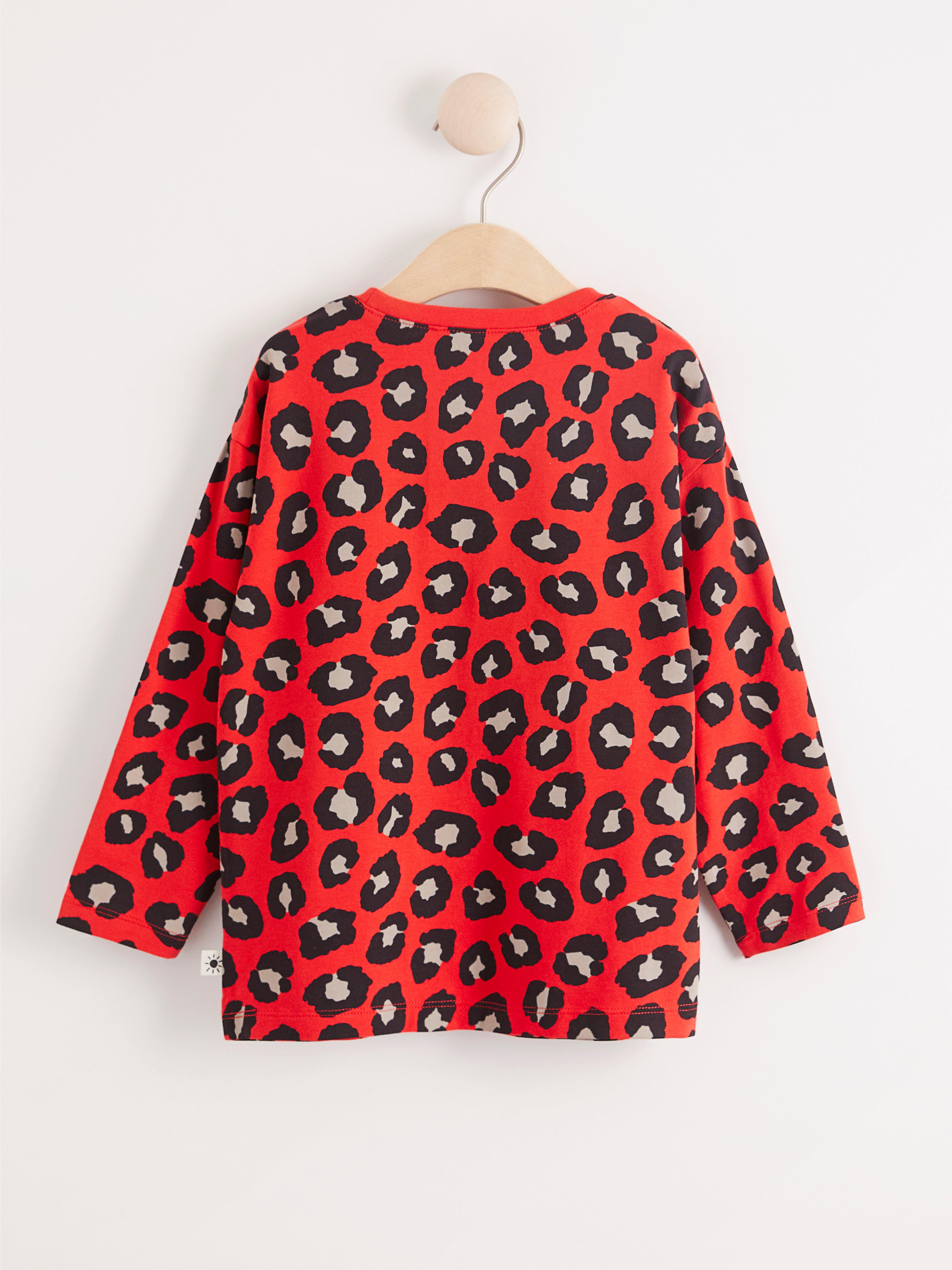 red leopard print long sleeve top