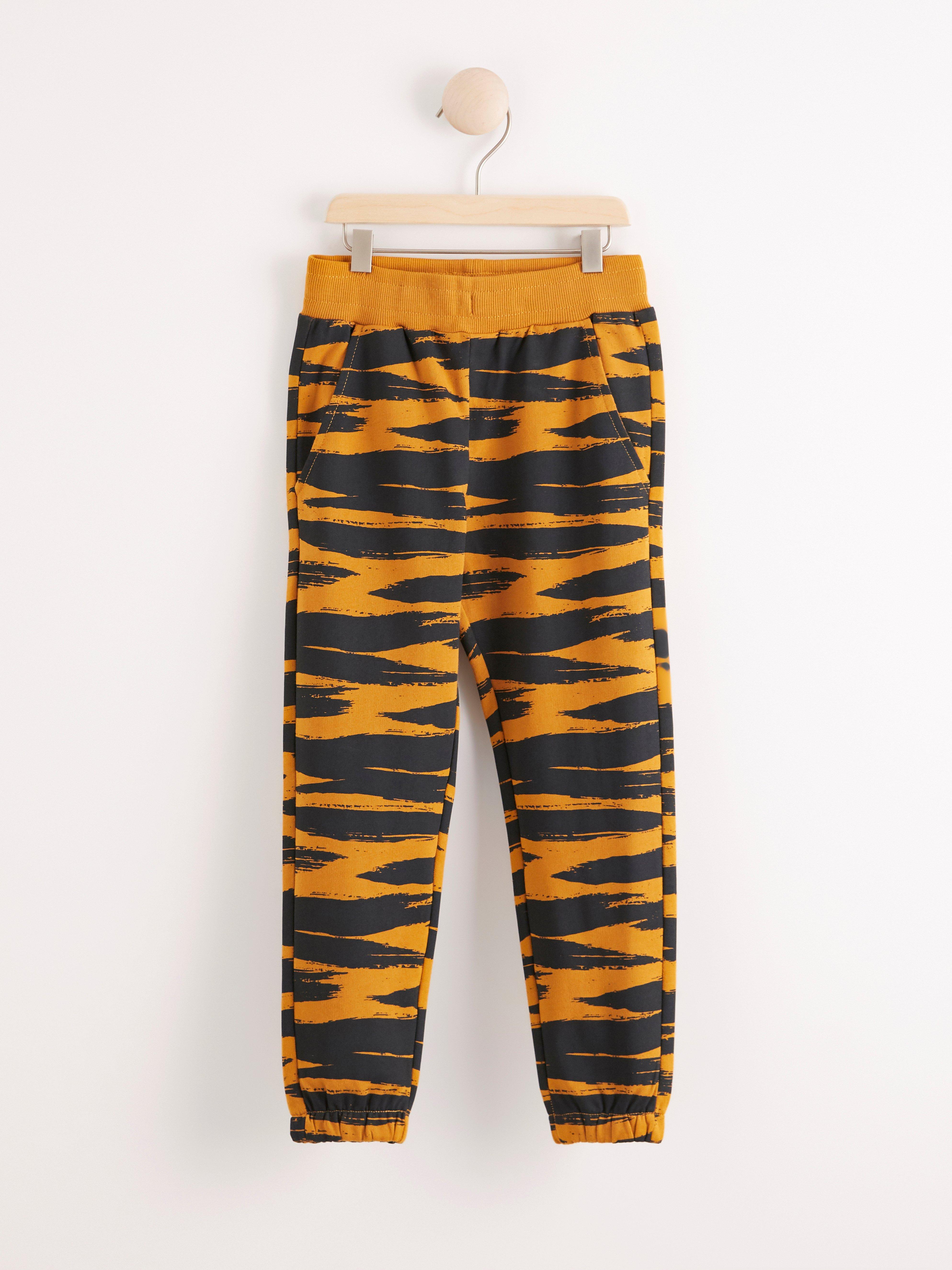 orange and black sweatpants