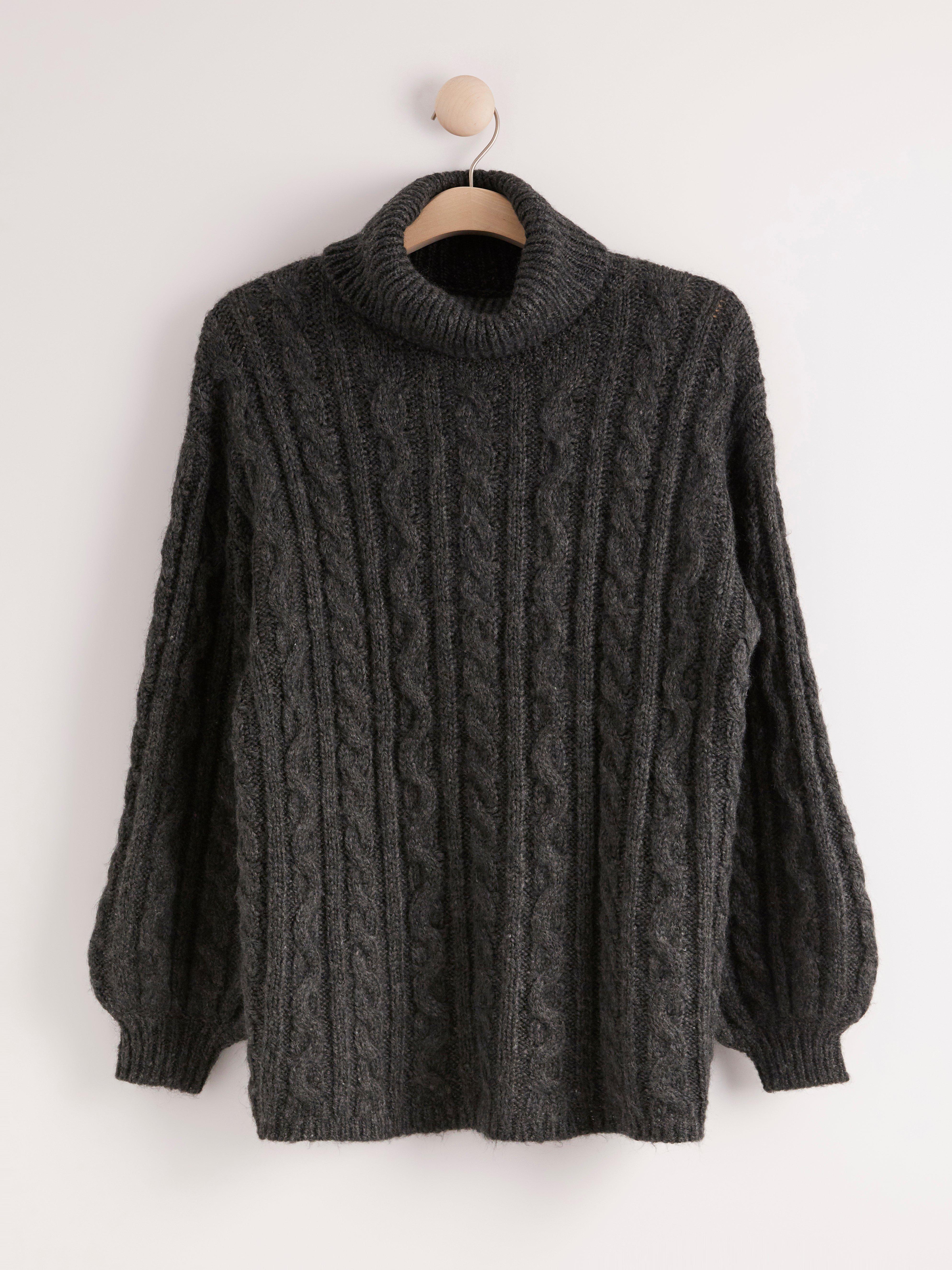 black cable knit roll neck