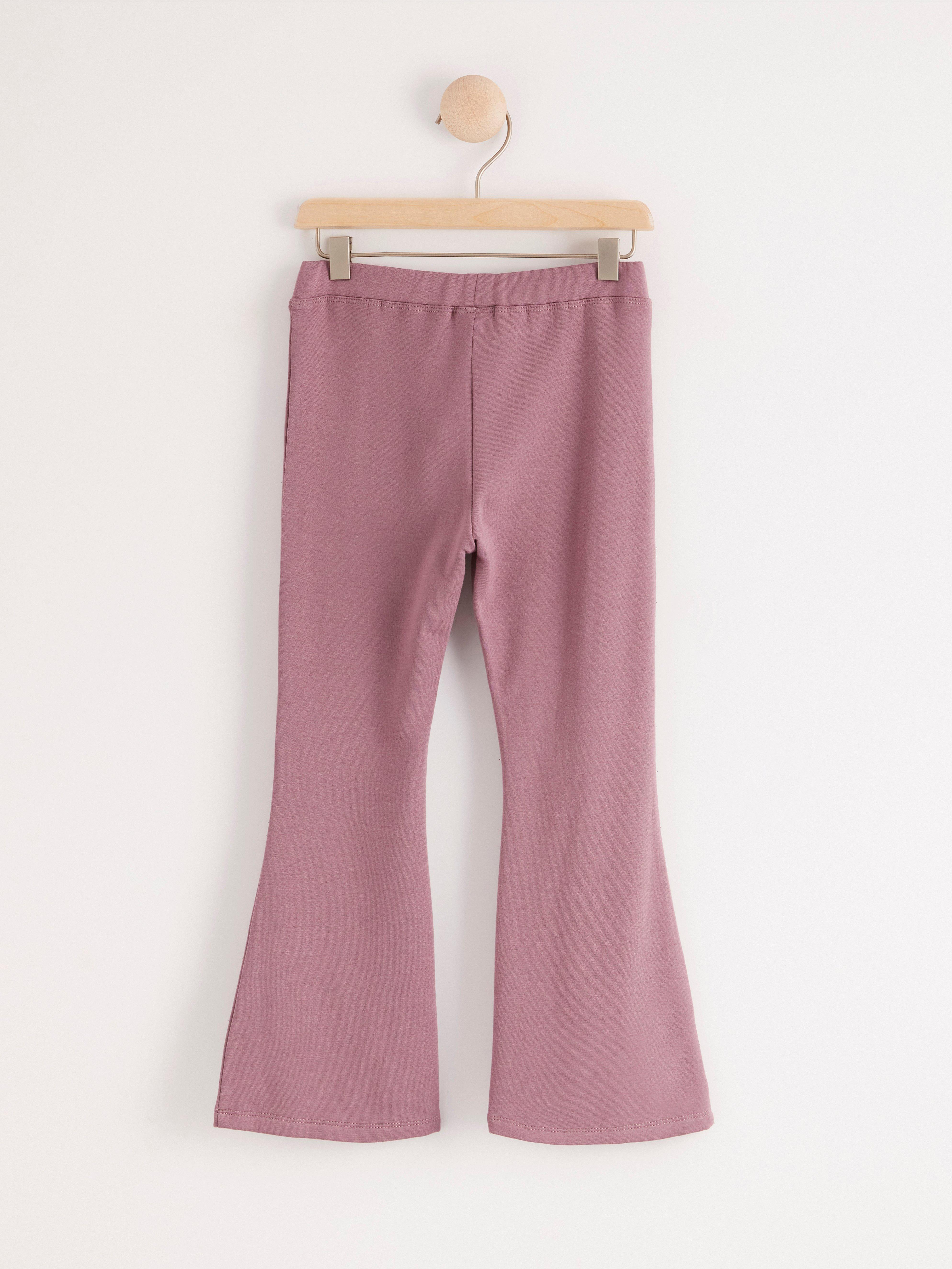 baby pink flared trousers