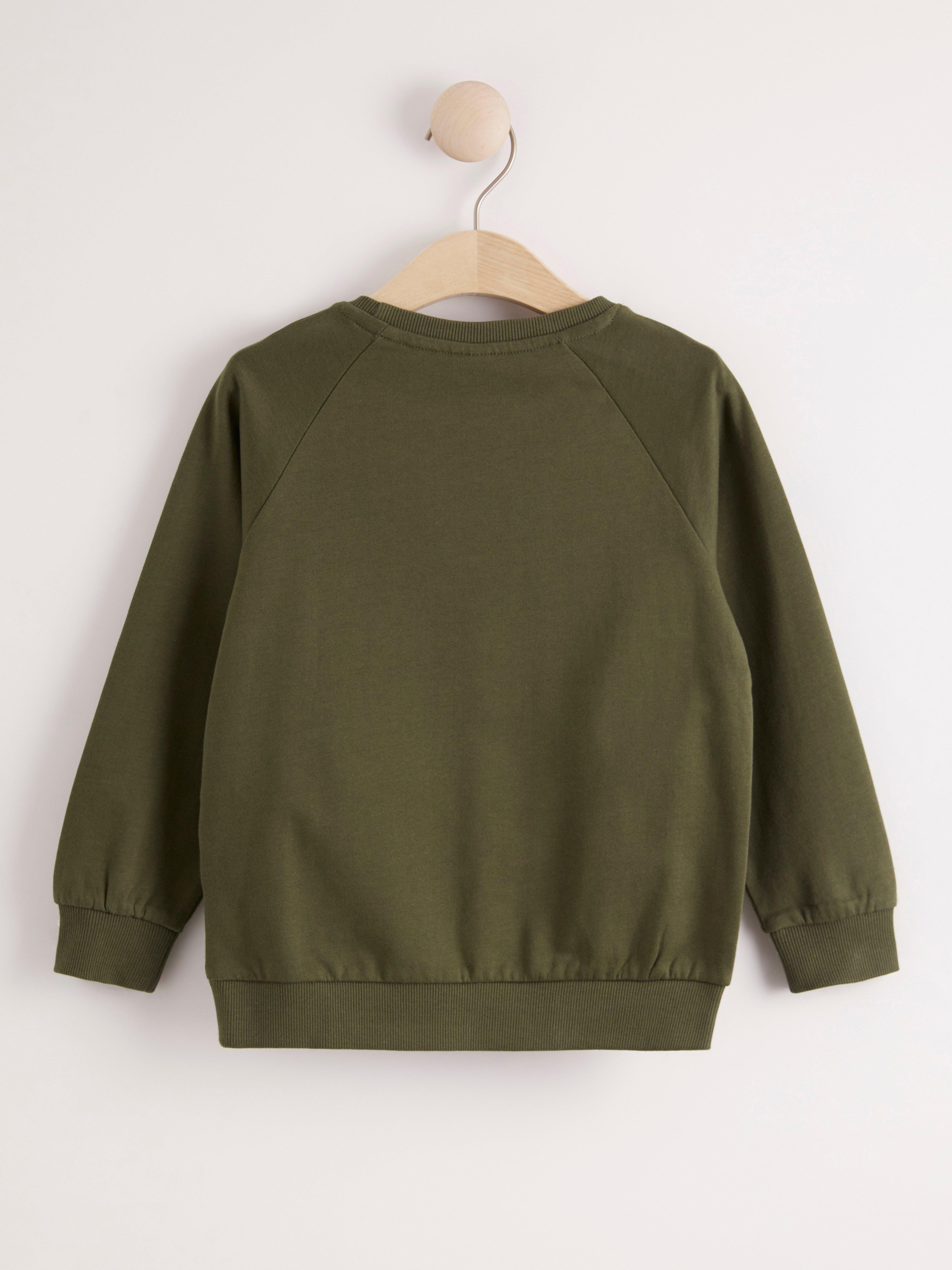 dark green sweatshirt