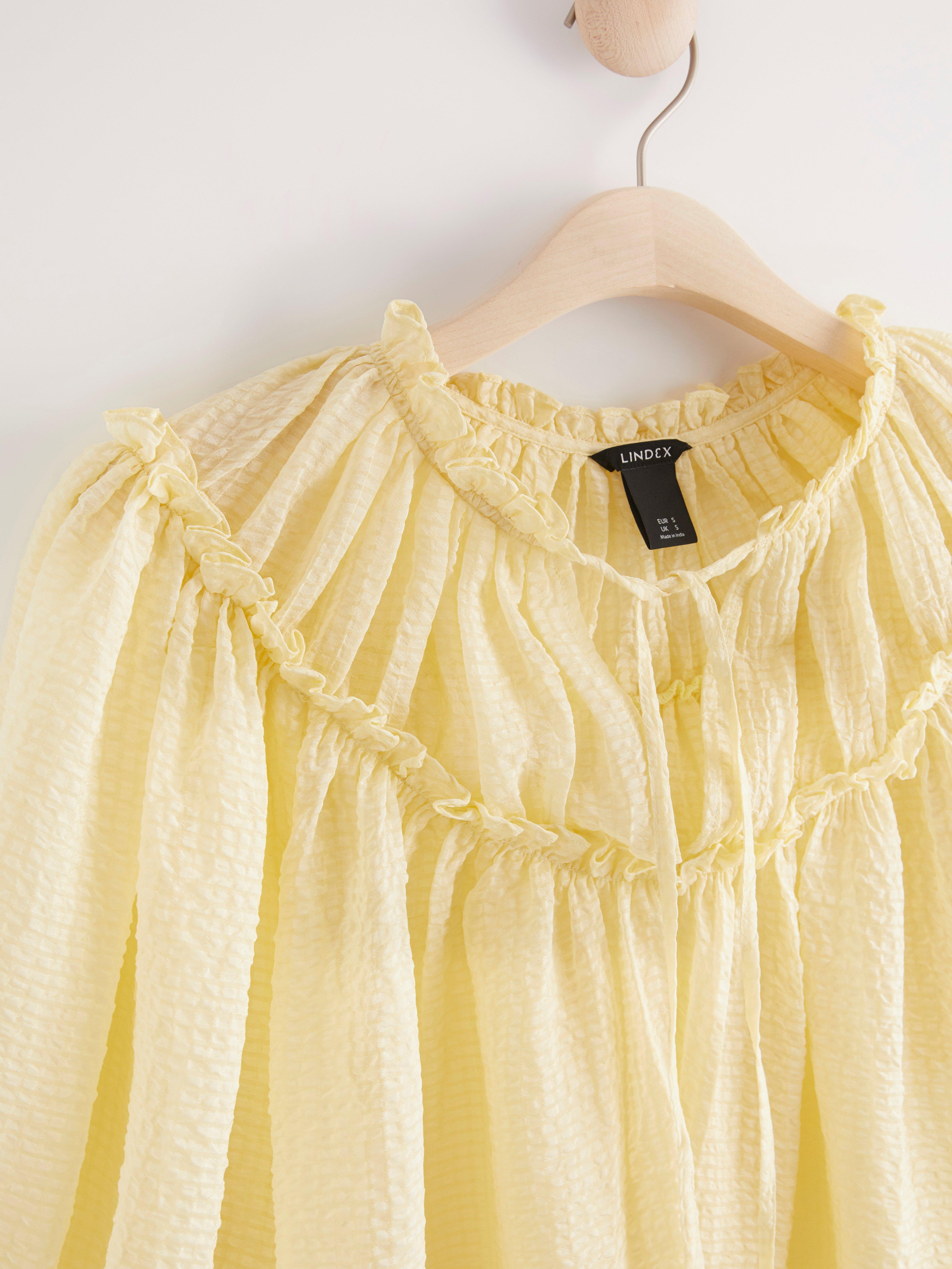 yellow puff sleeve blouse