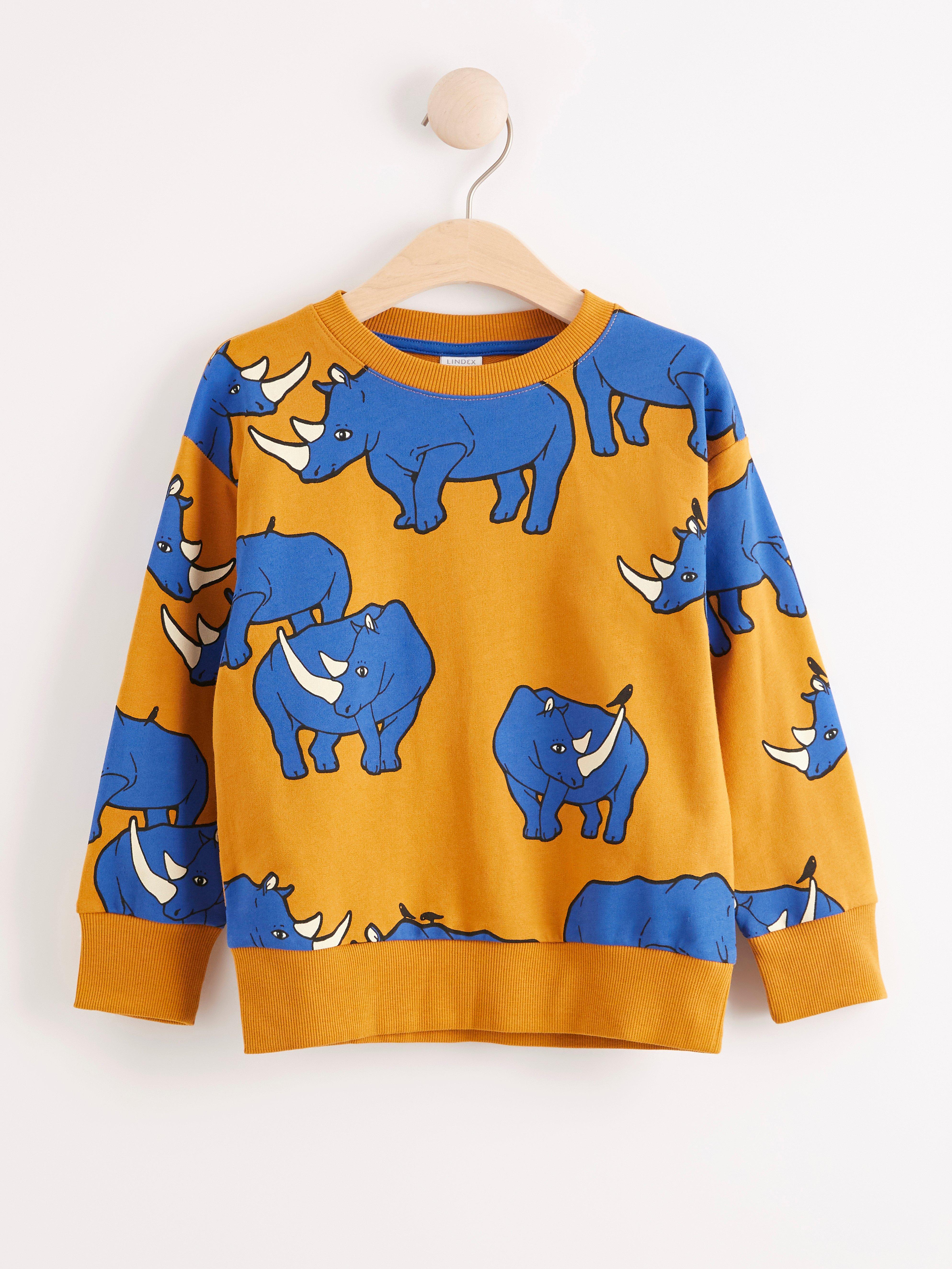 mustard colored sweatshirt