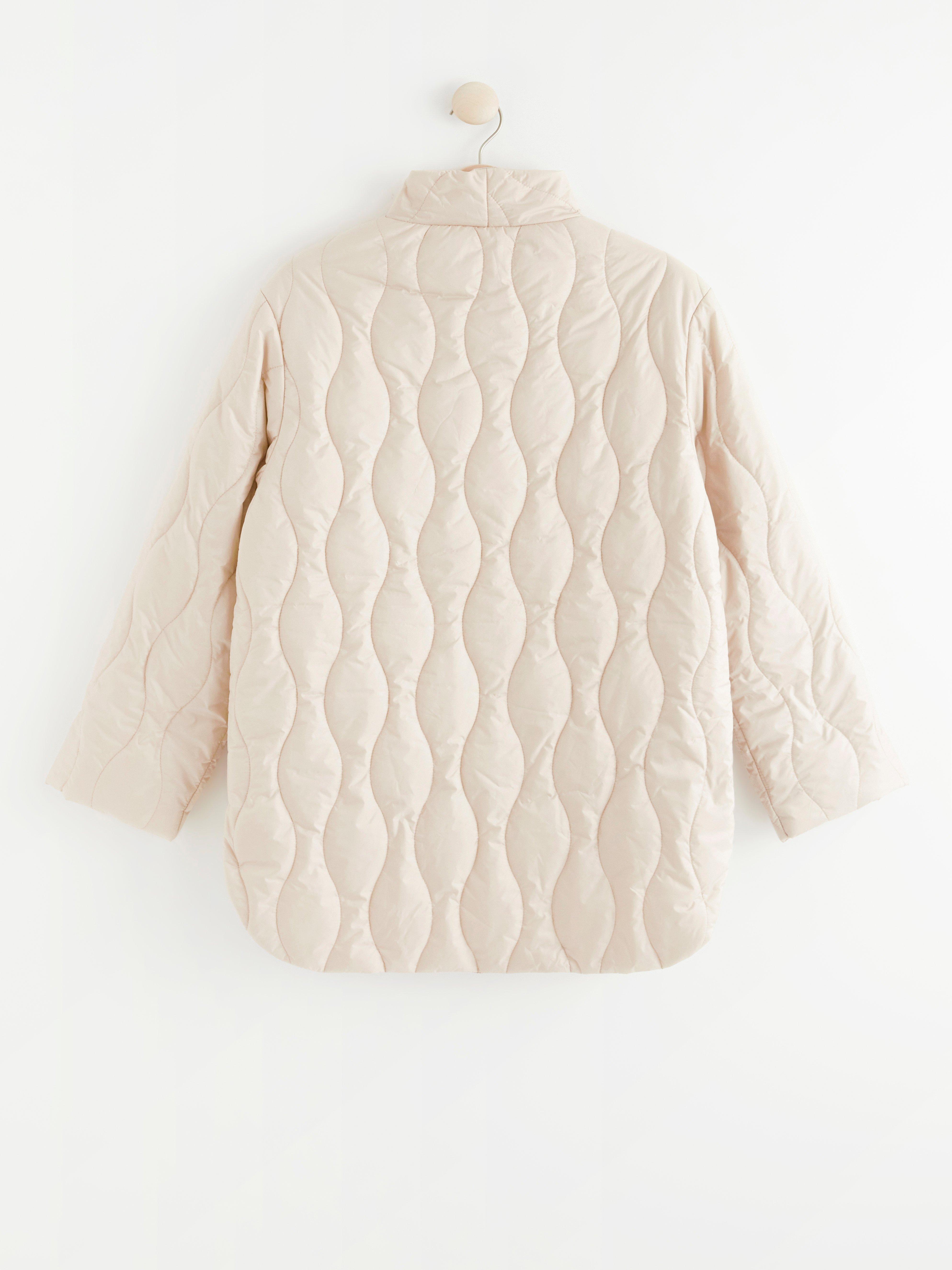 tan quilted jacket