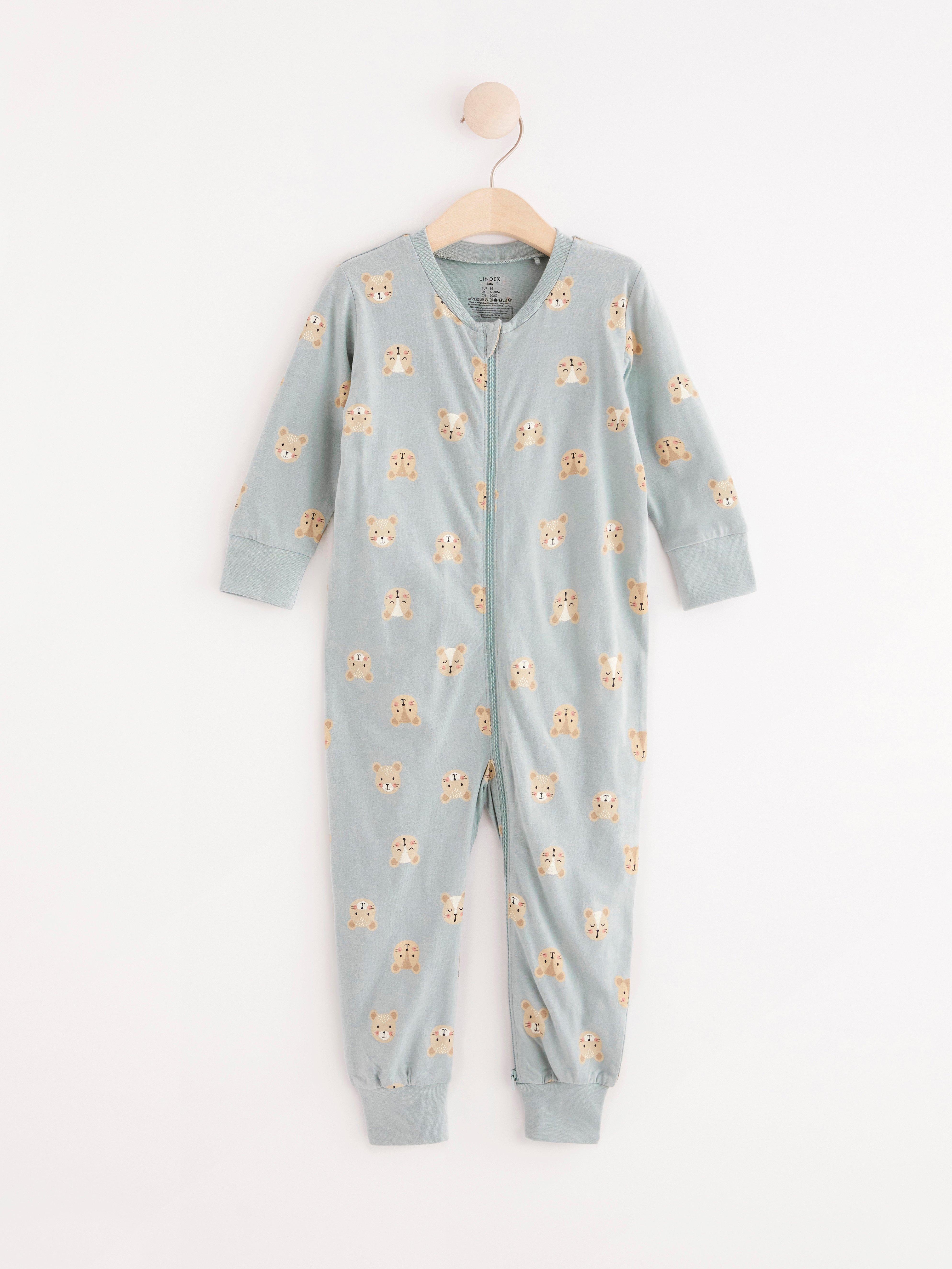 Pyjamas med möss och applikation på baksidan
