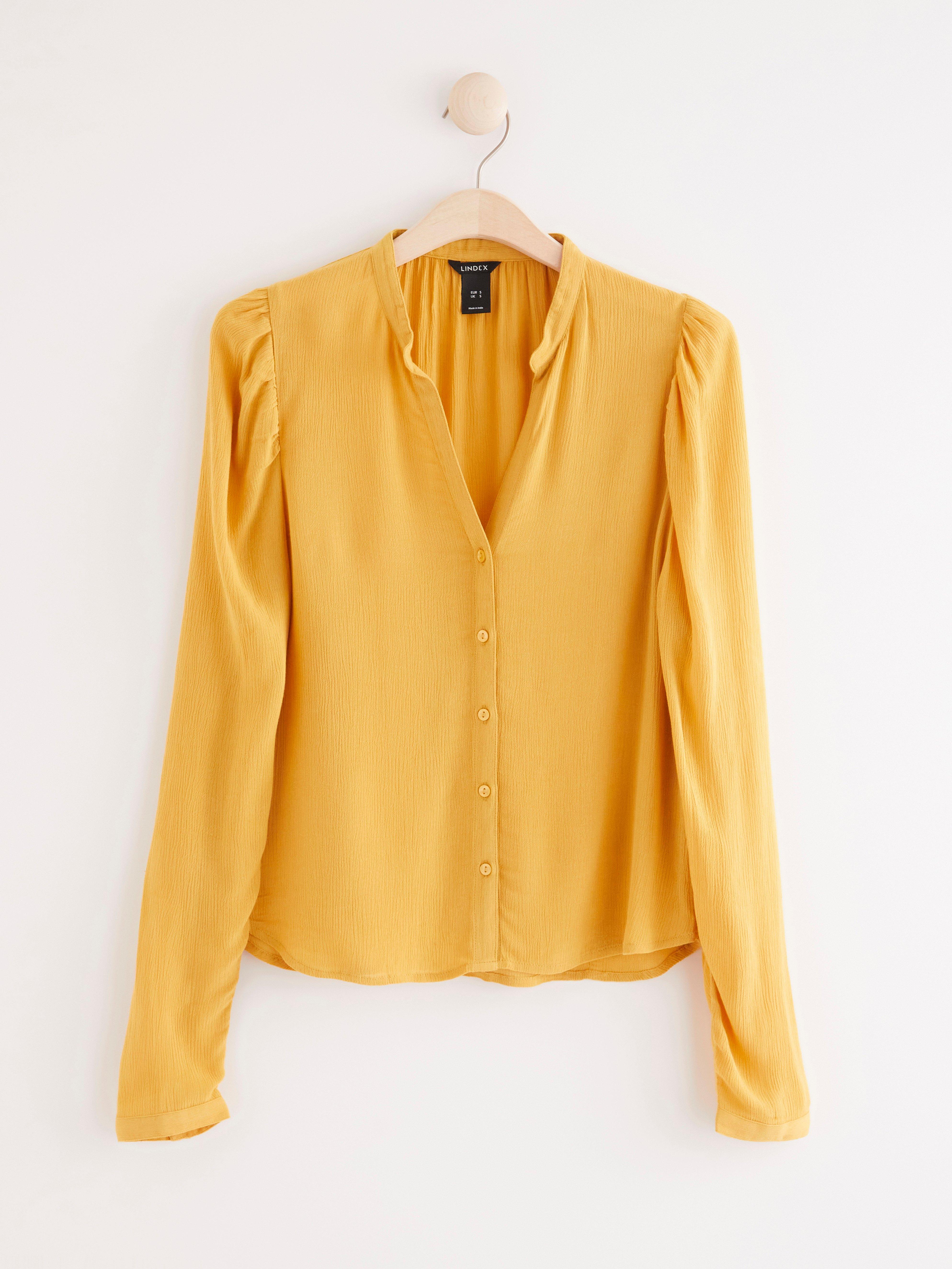 yellow long sleeve blouse