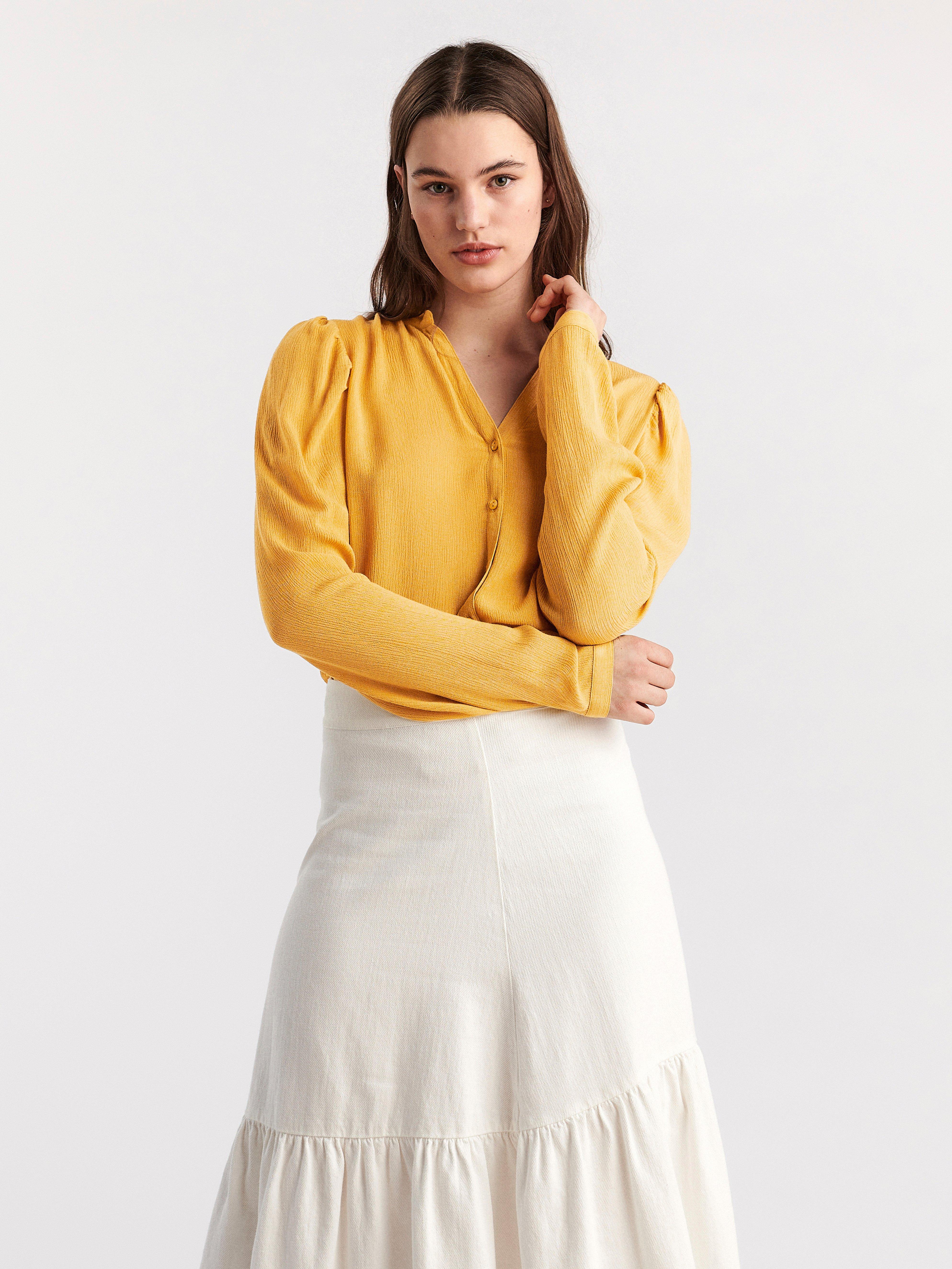 yellow long sleeve blouse