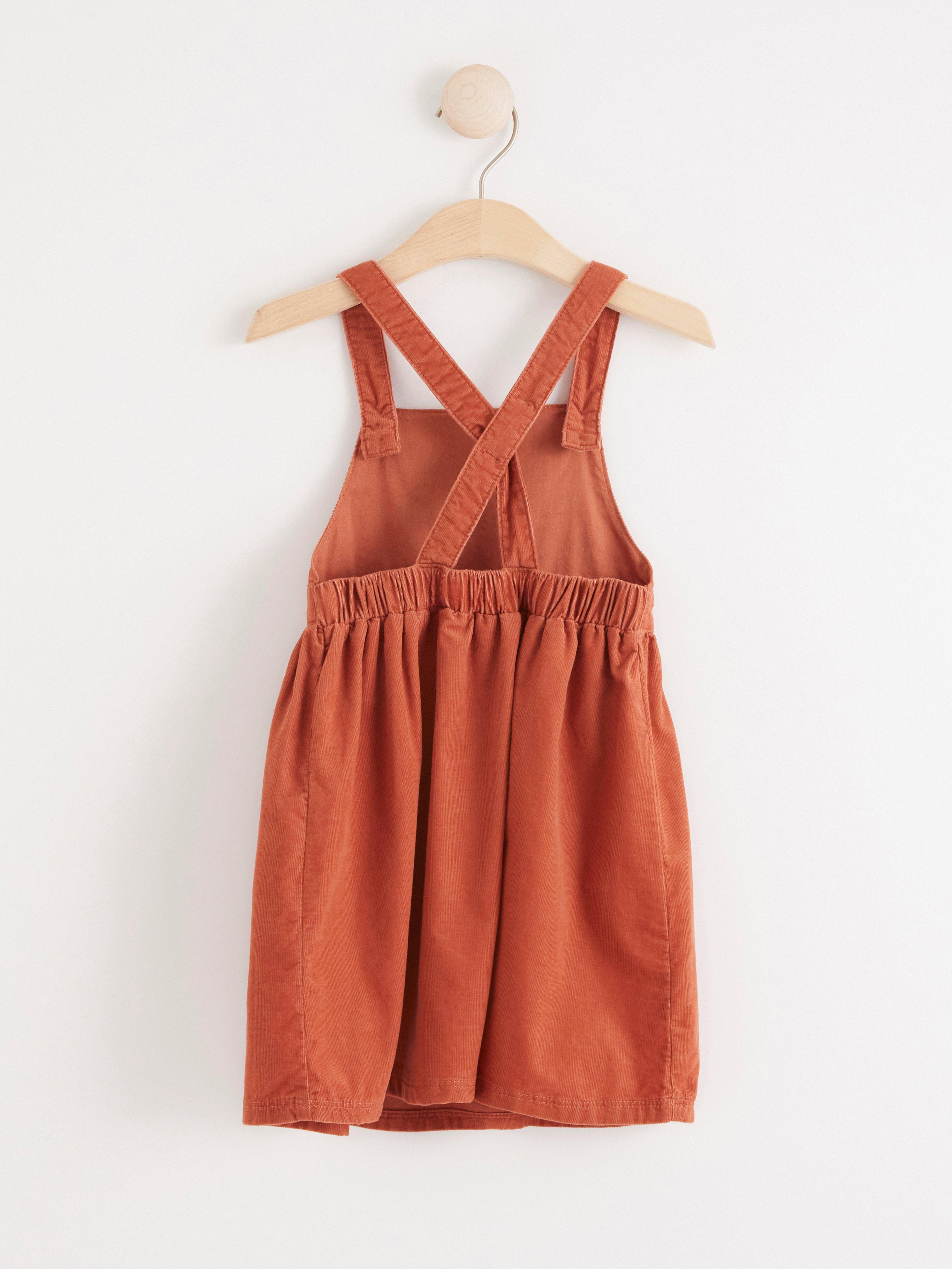 Corduroy dungaree dress | Lindex