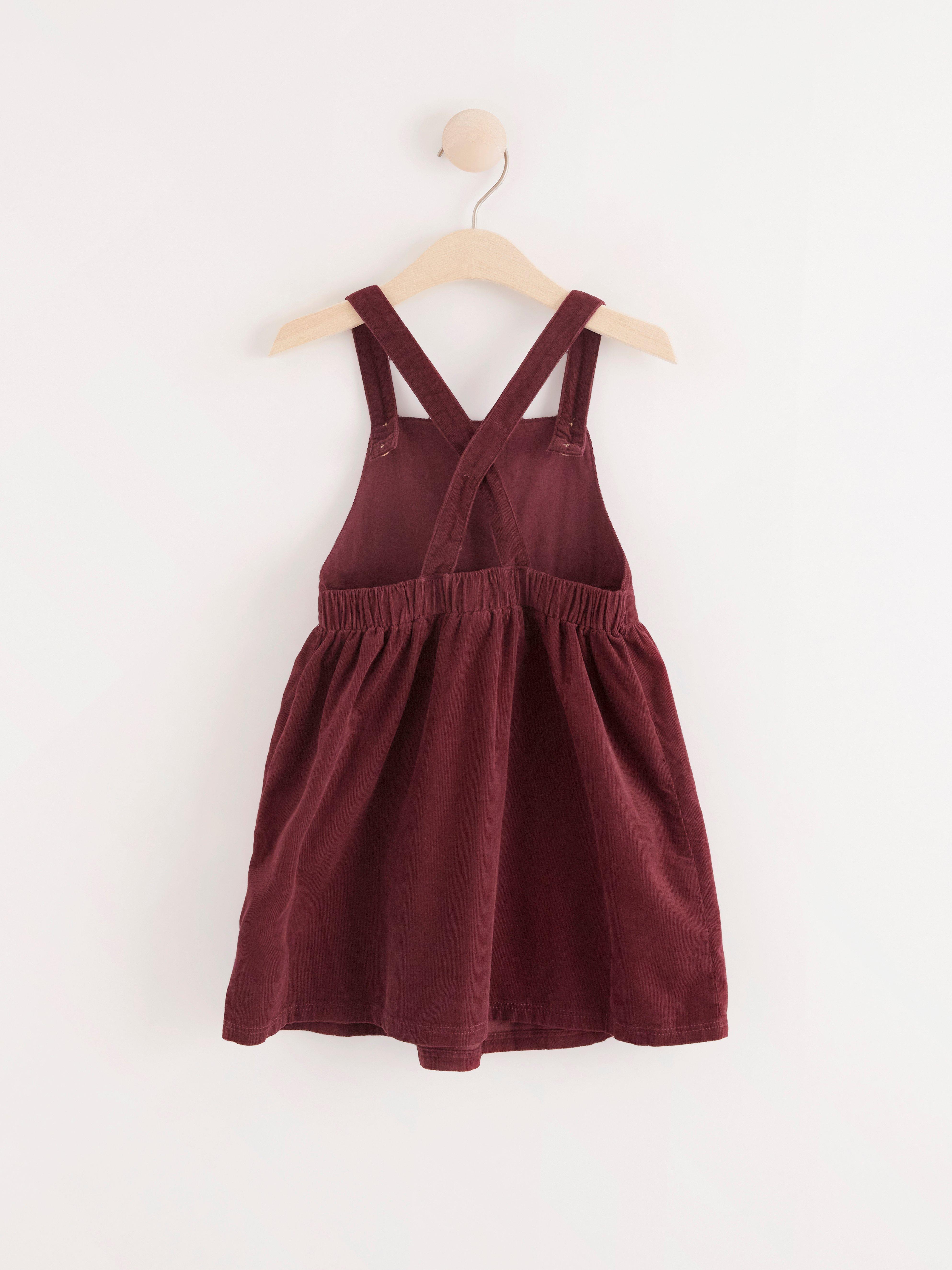 Corduroy dungaree dress | Lindex
