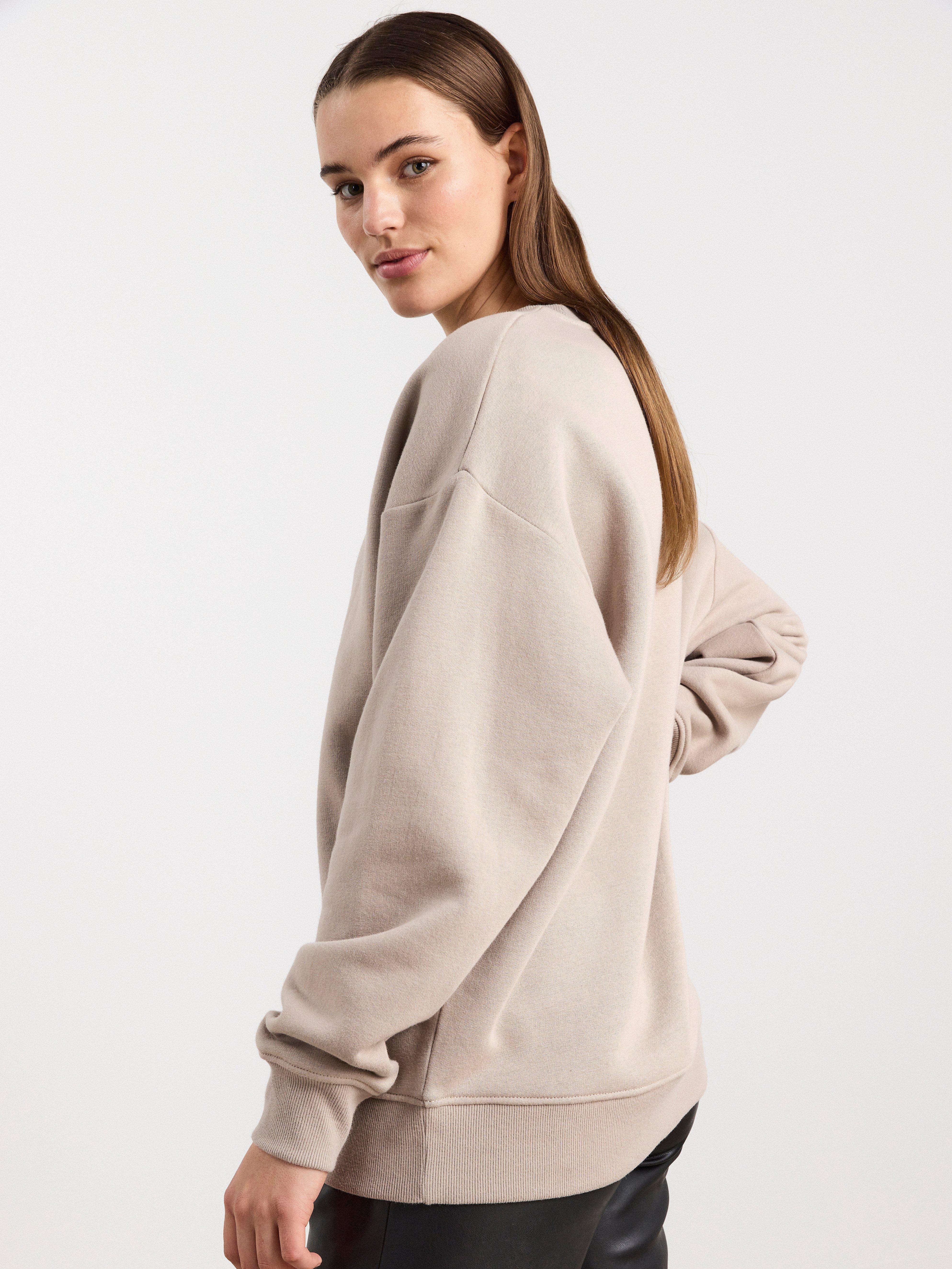 oversized beige sweatshirt