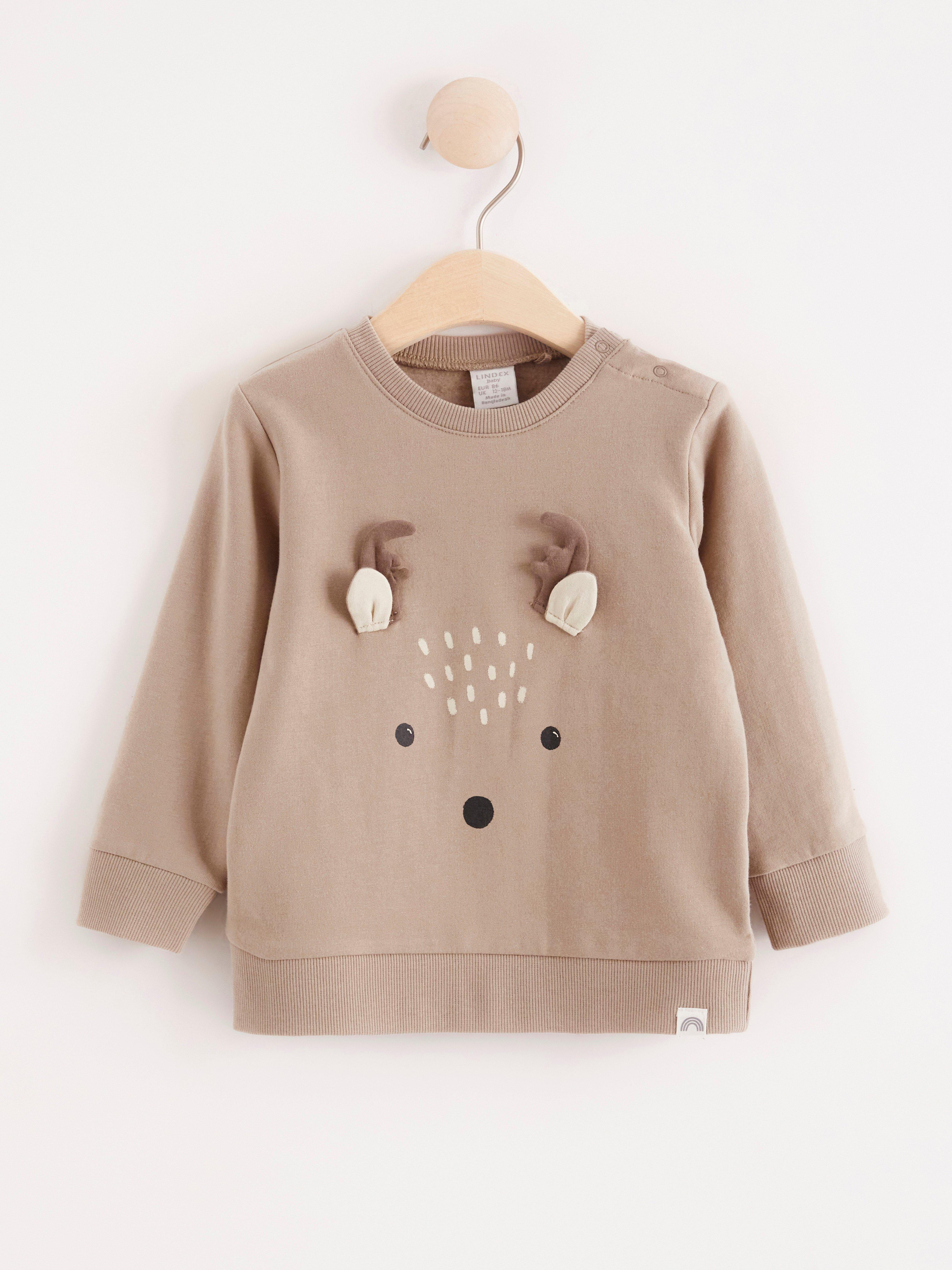 Sweatshirt med renapplikation
