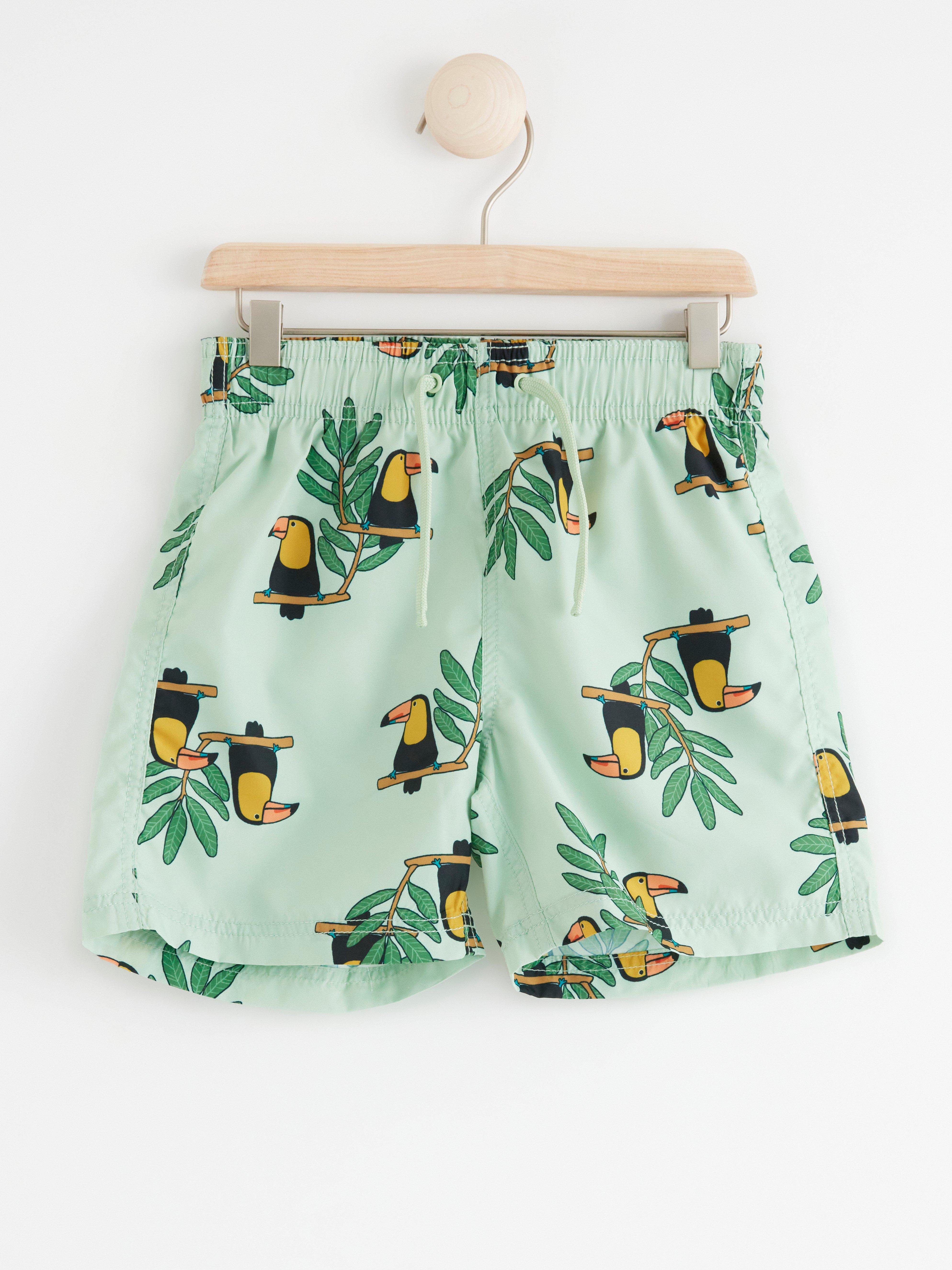 Swim shorts with toucan birds Lindex Lithuania