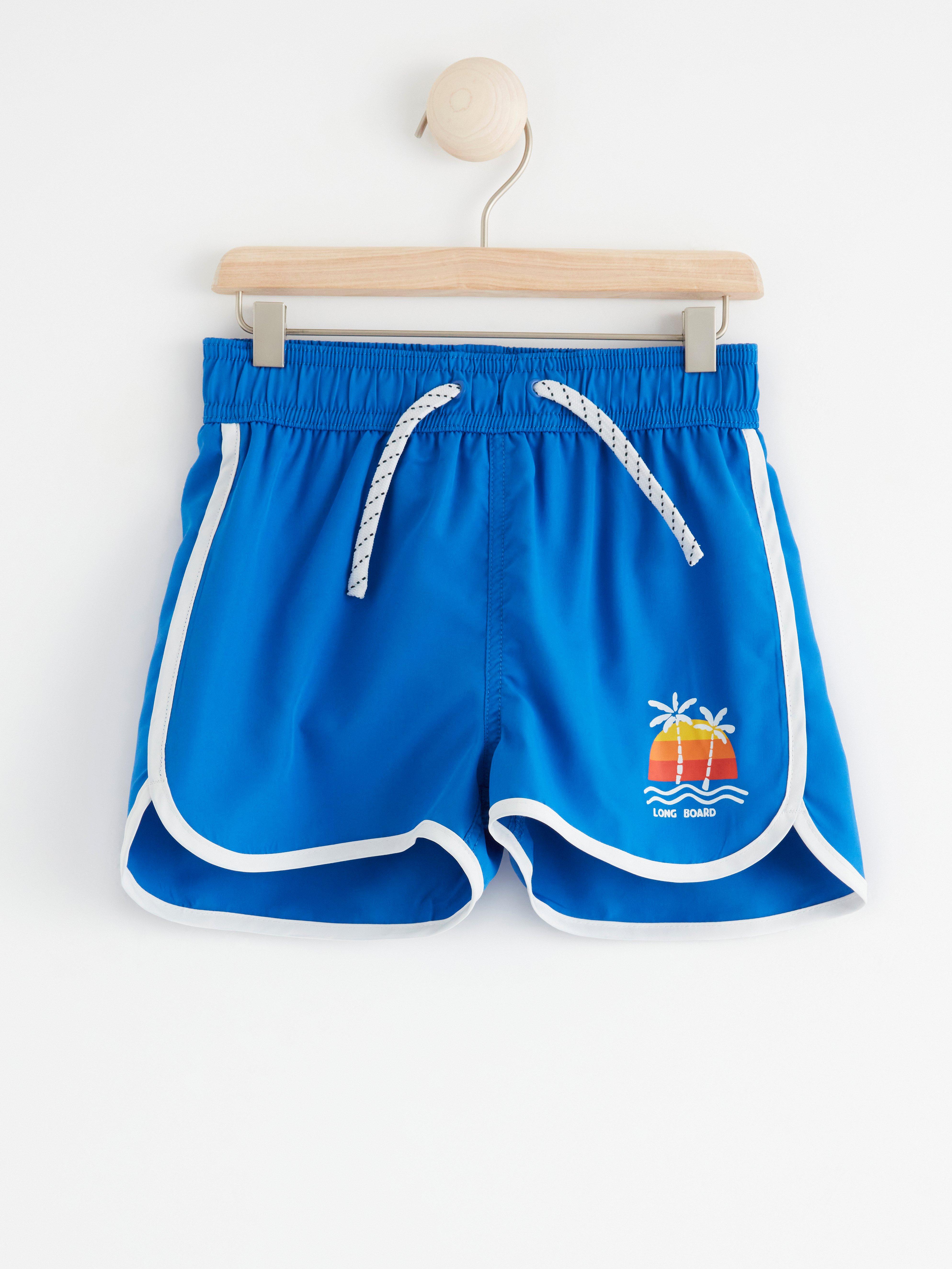 Badshorts med surfmotiv