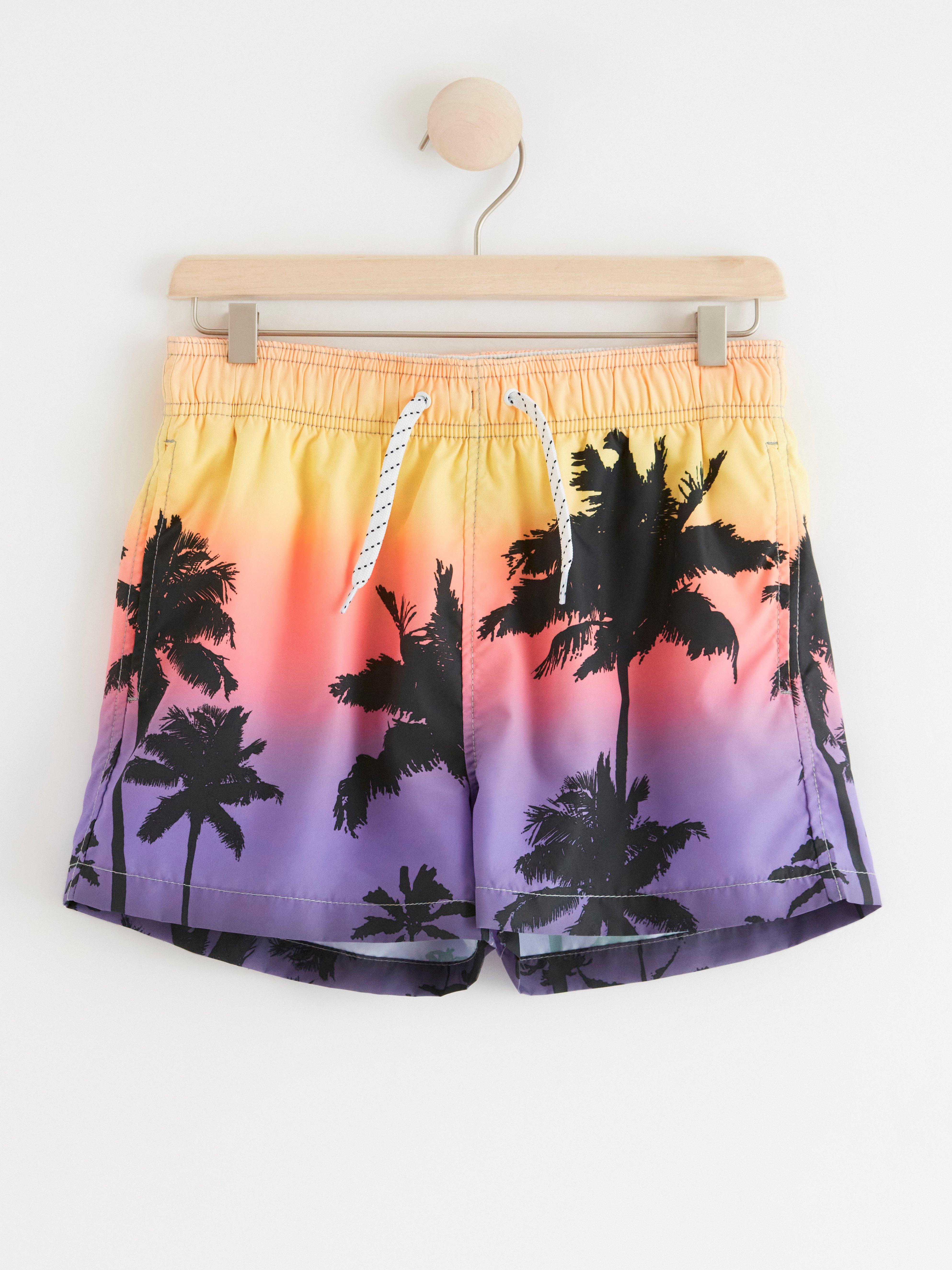 Badshorts med palmer