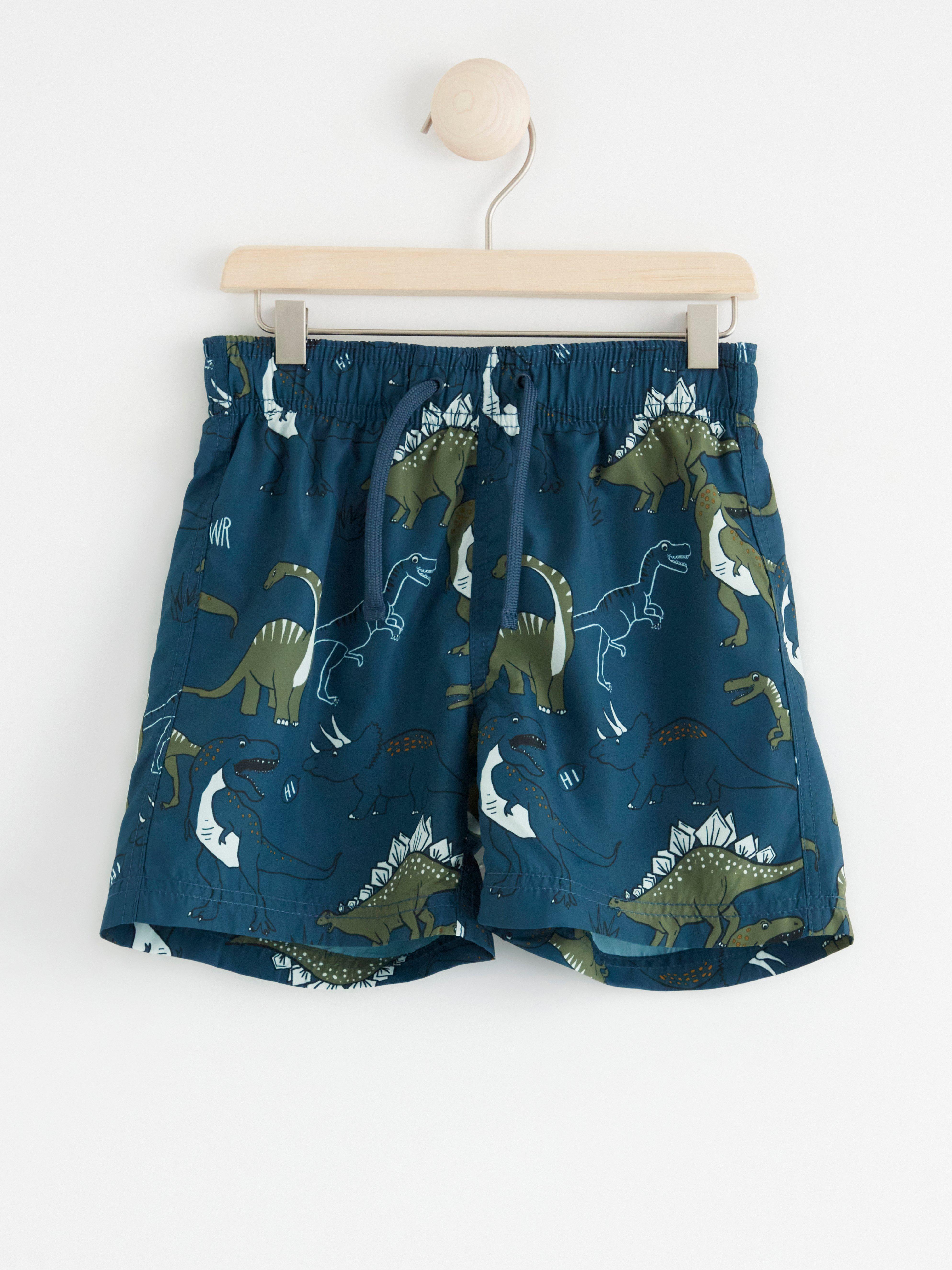 Badshorts med dinosaurier