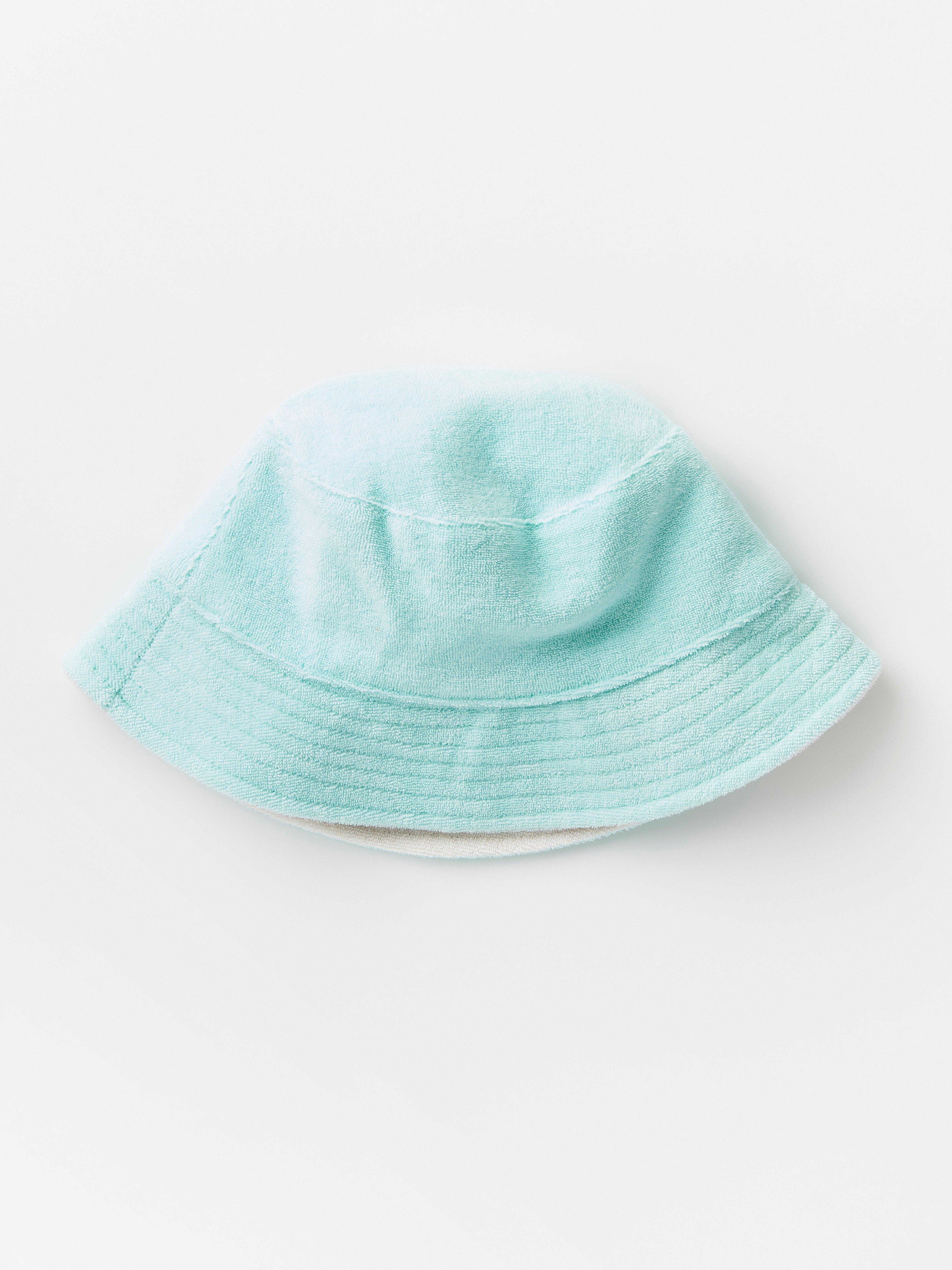 Vändbar bucket hat i frotté