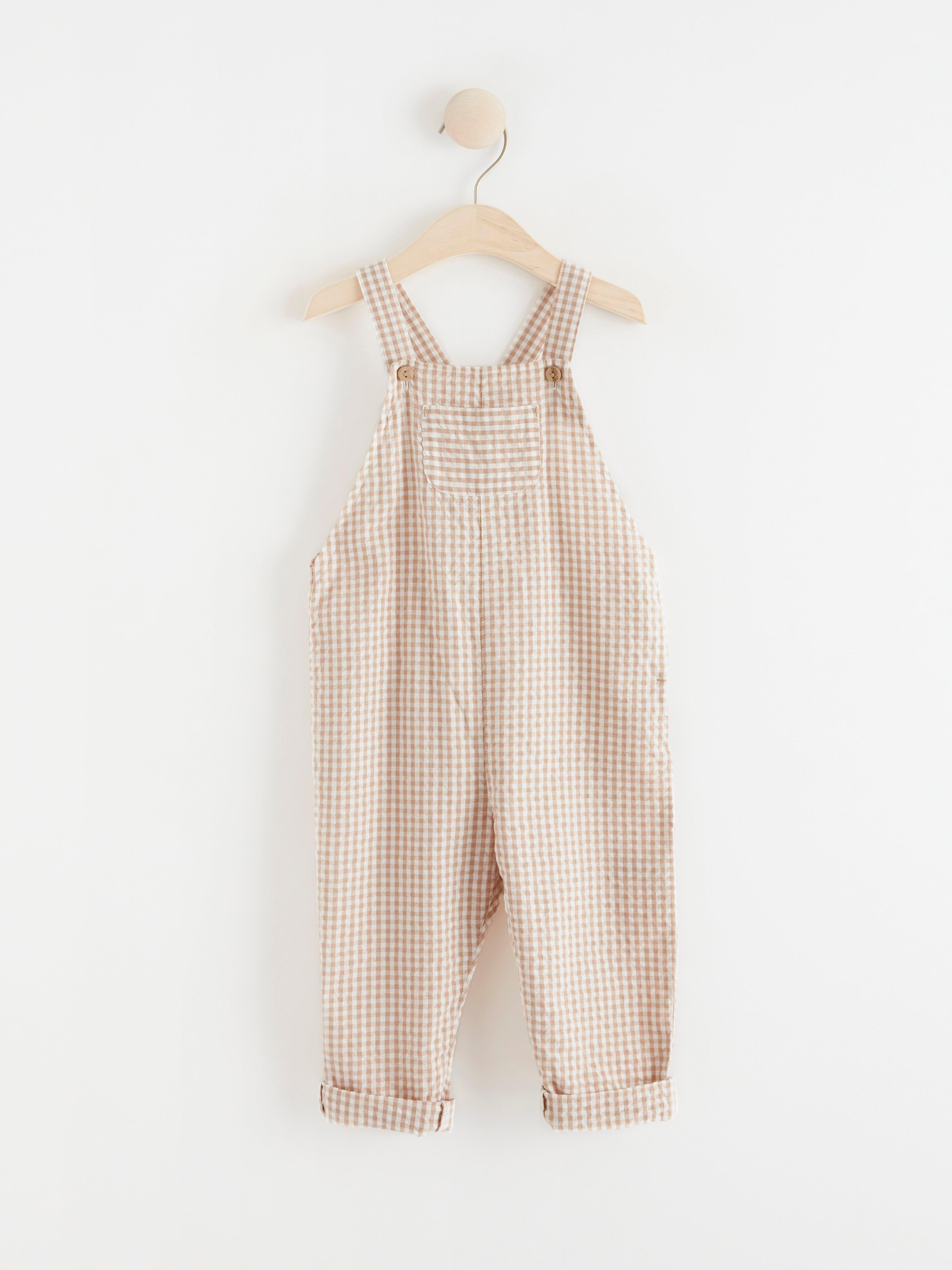 Nohavice s náprsníkom a trakmi - Deti - Béžová