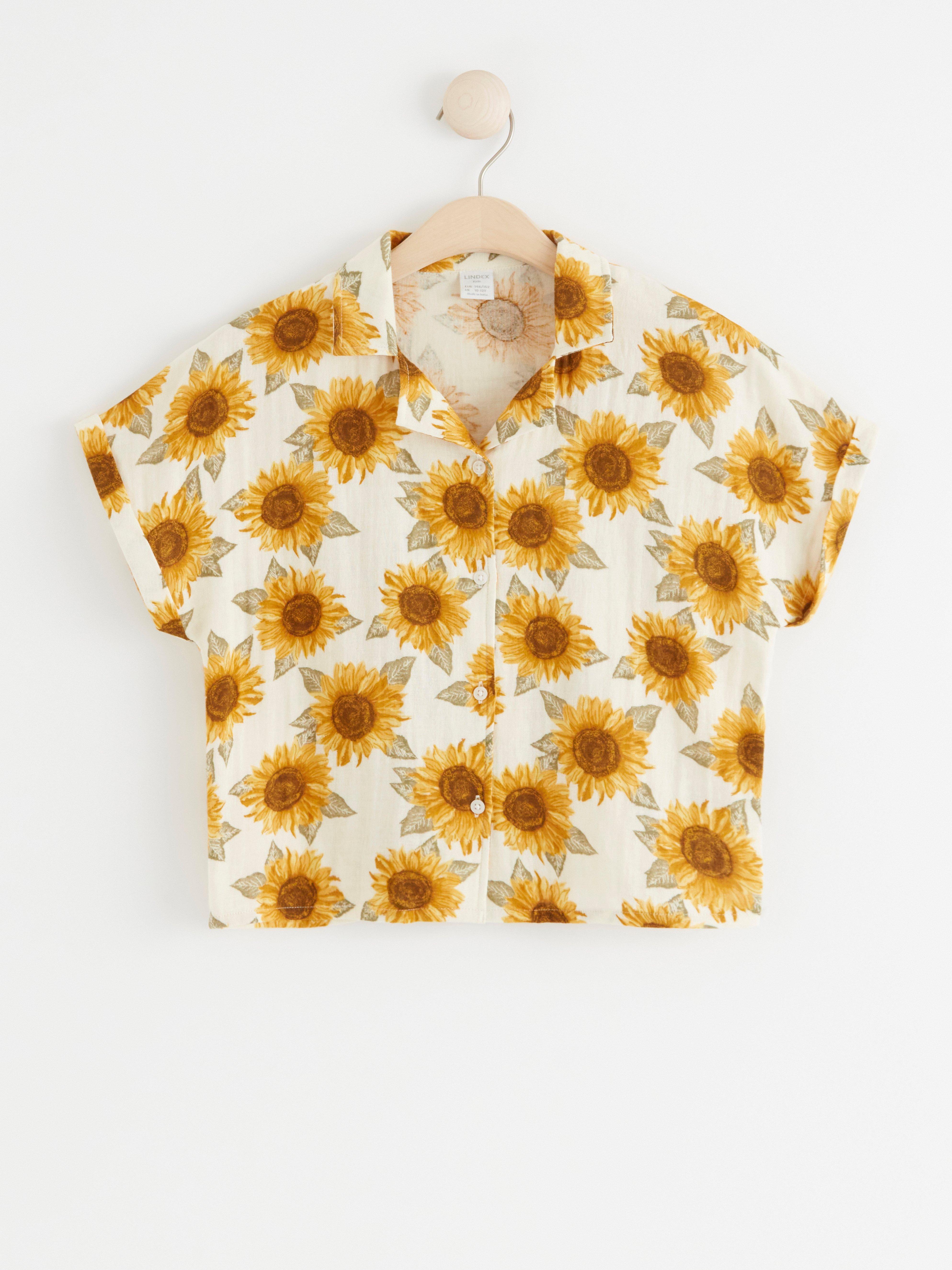 Kortärmad skjorta med solrosor