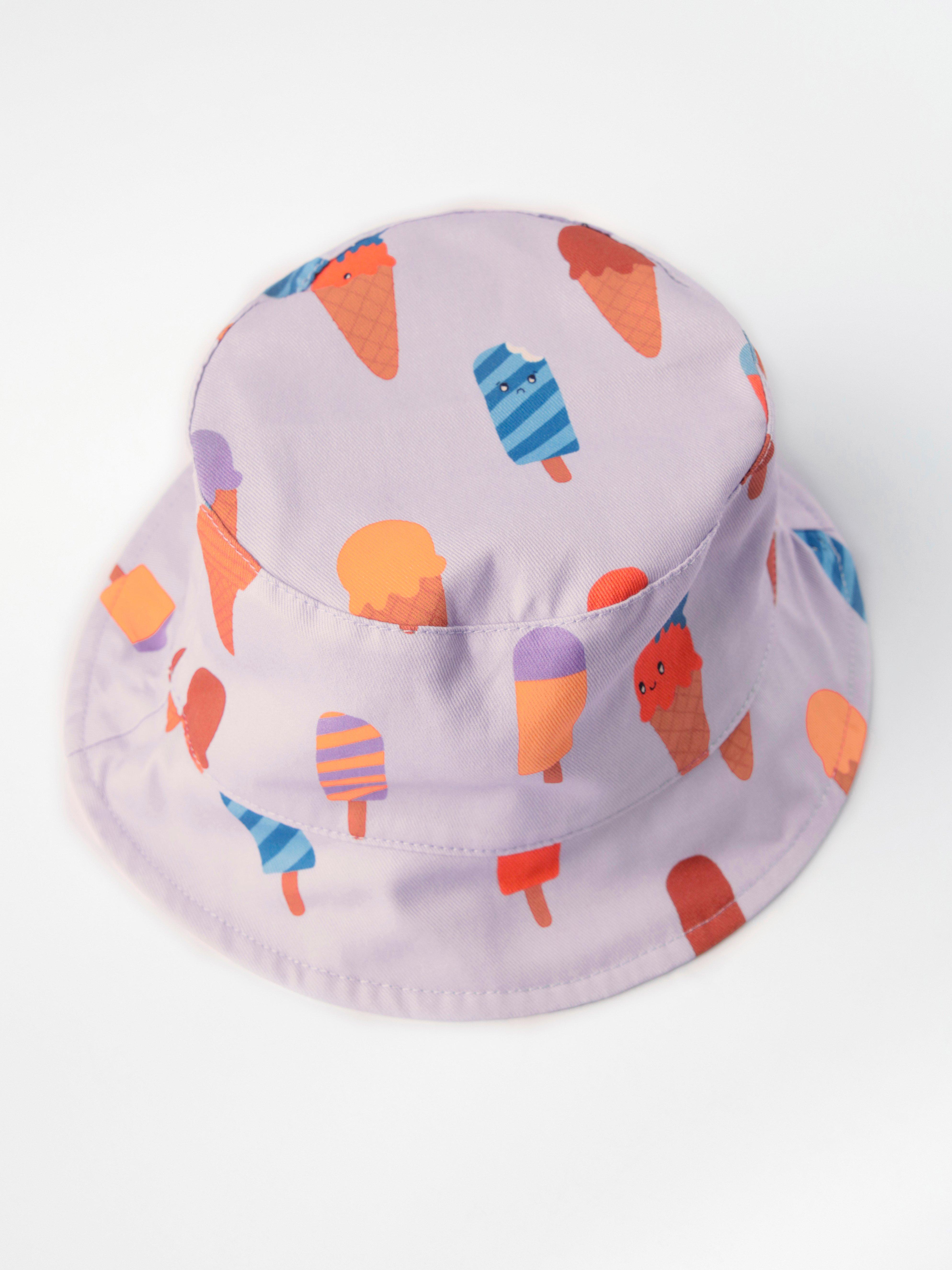 Vändbar bucket hat med mönster