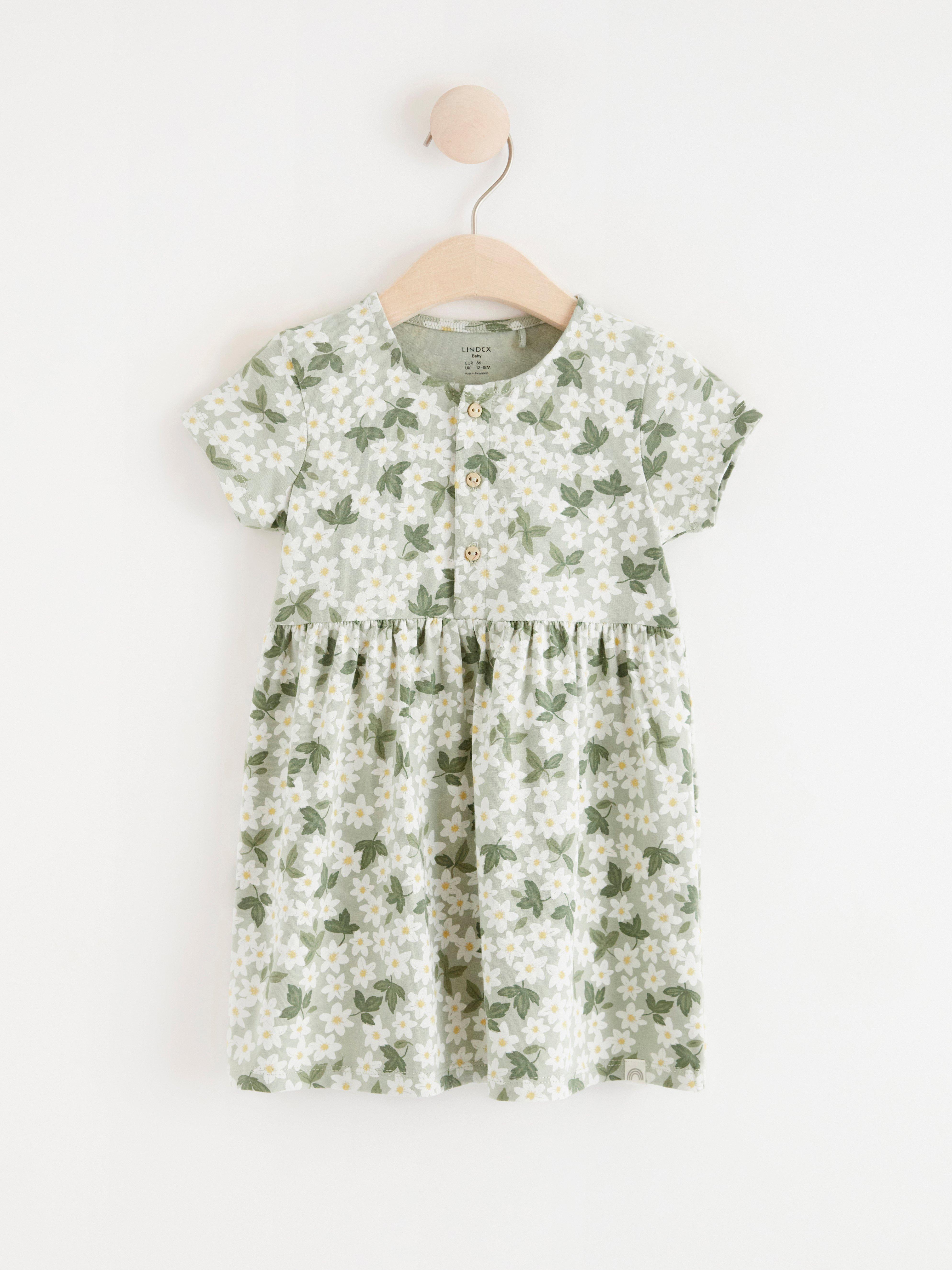 Kortermet jerseykjole med blomstertrykk