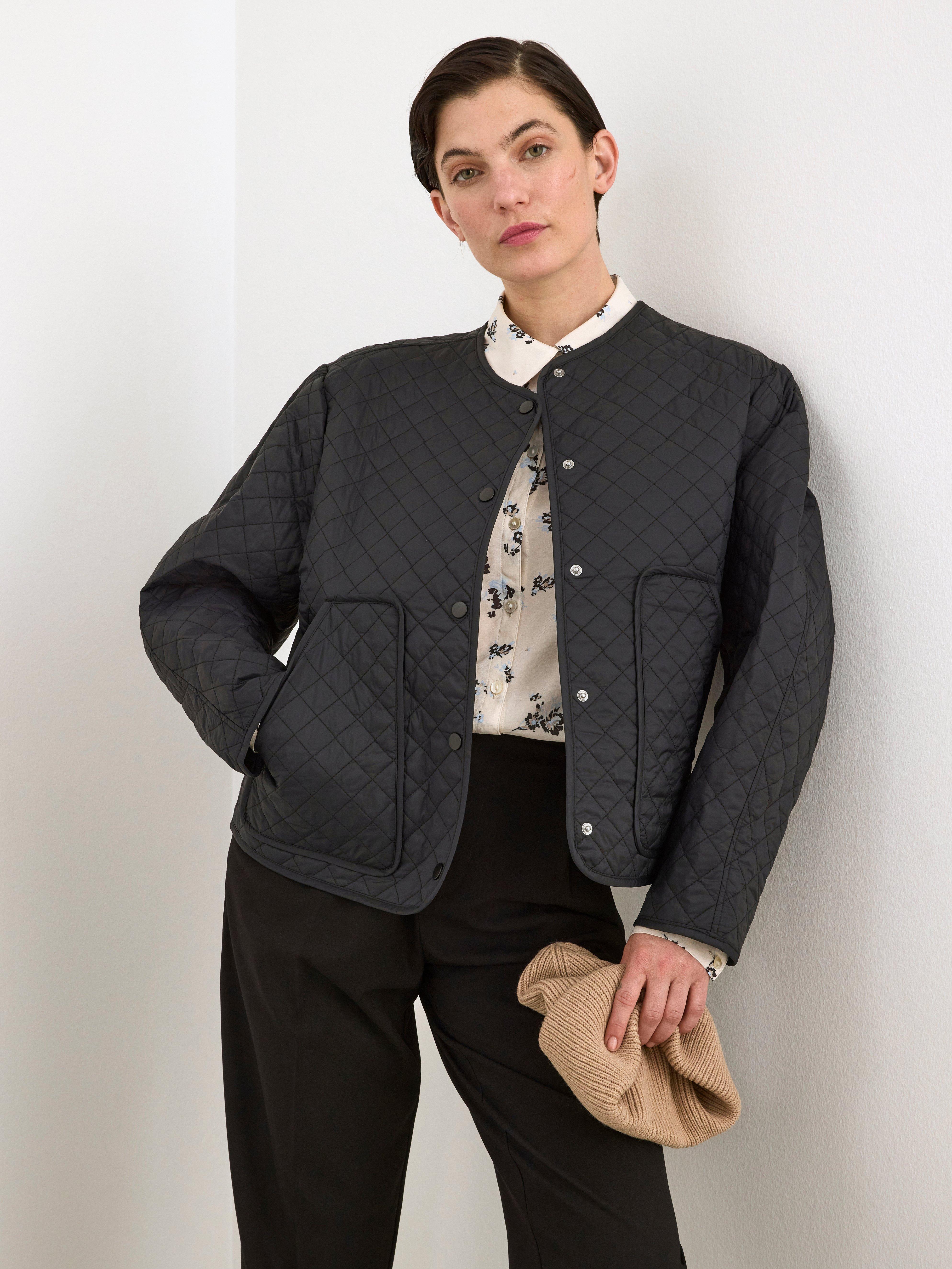 black quilted jacket with belt