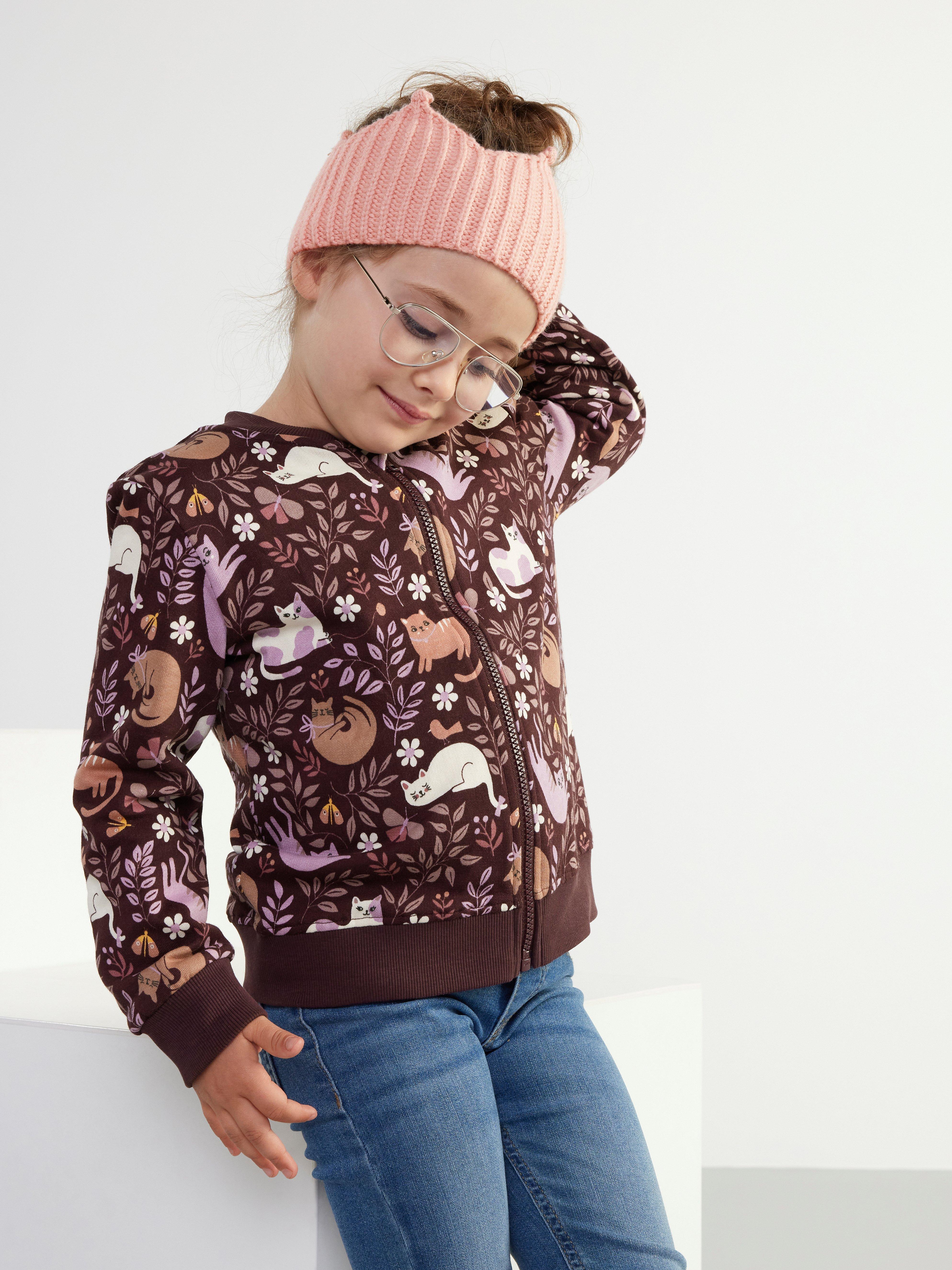 Mönstrad tröja med dragkedja