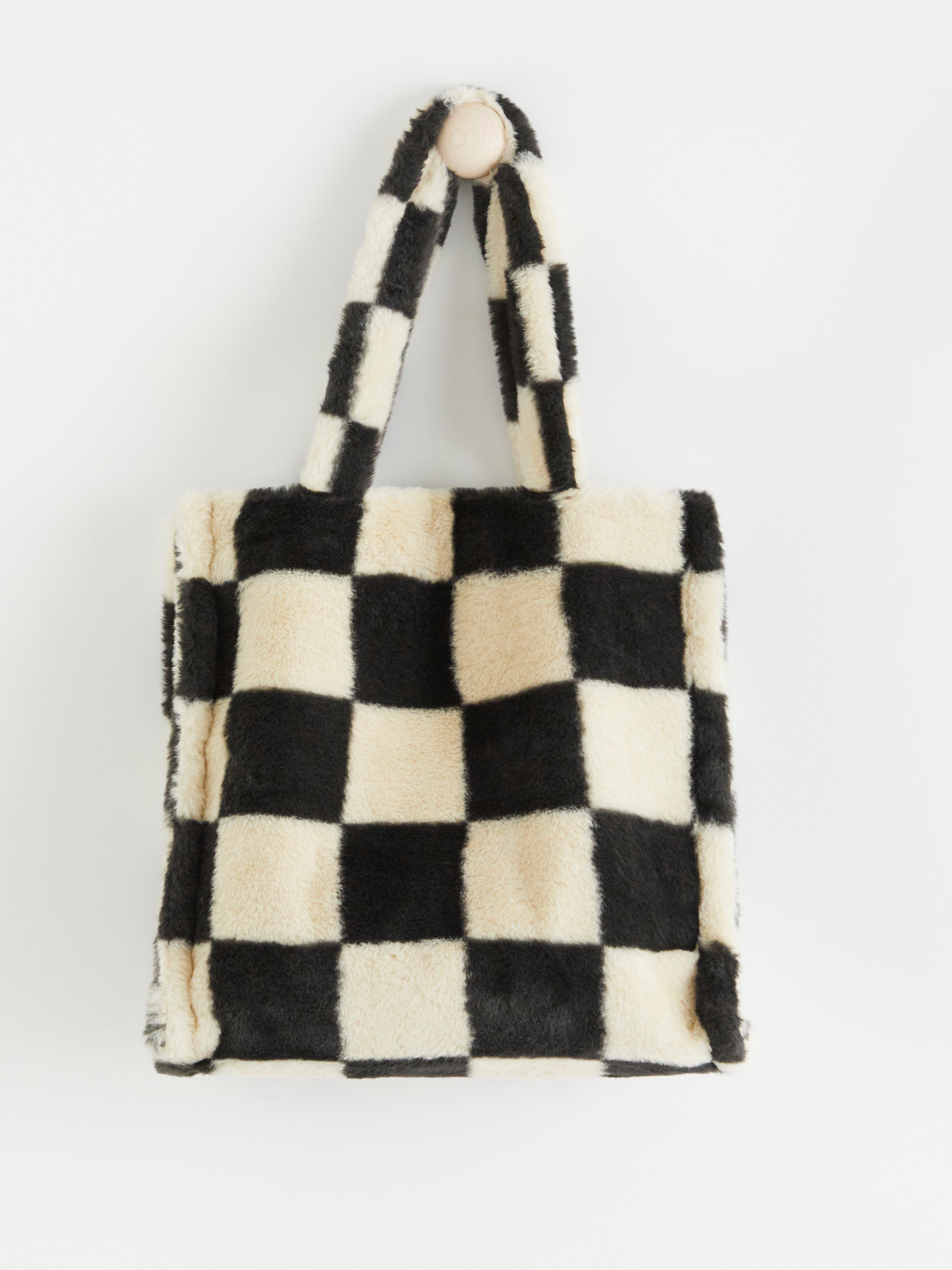 Shoppingväska i fuskpäls