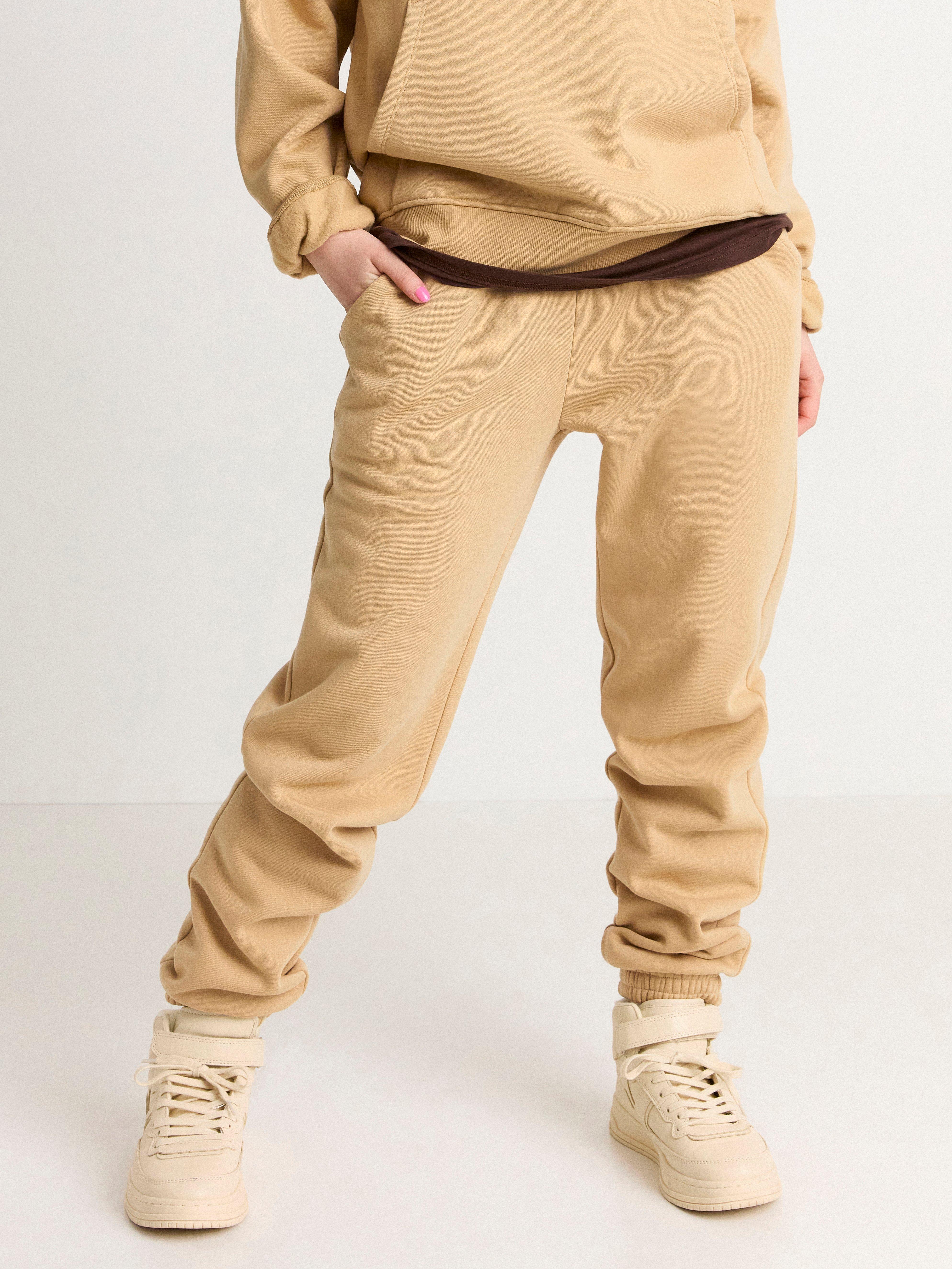 beige sweatpants