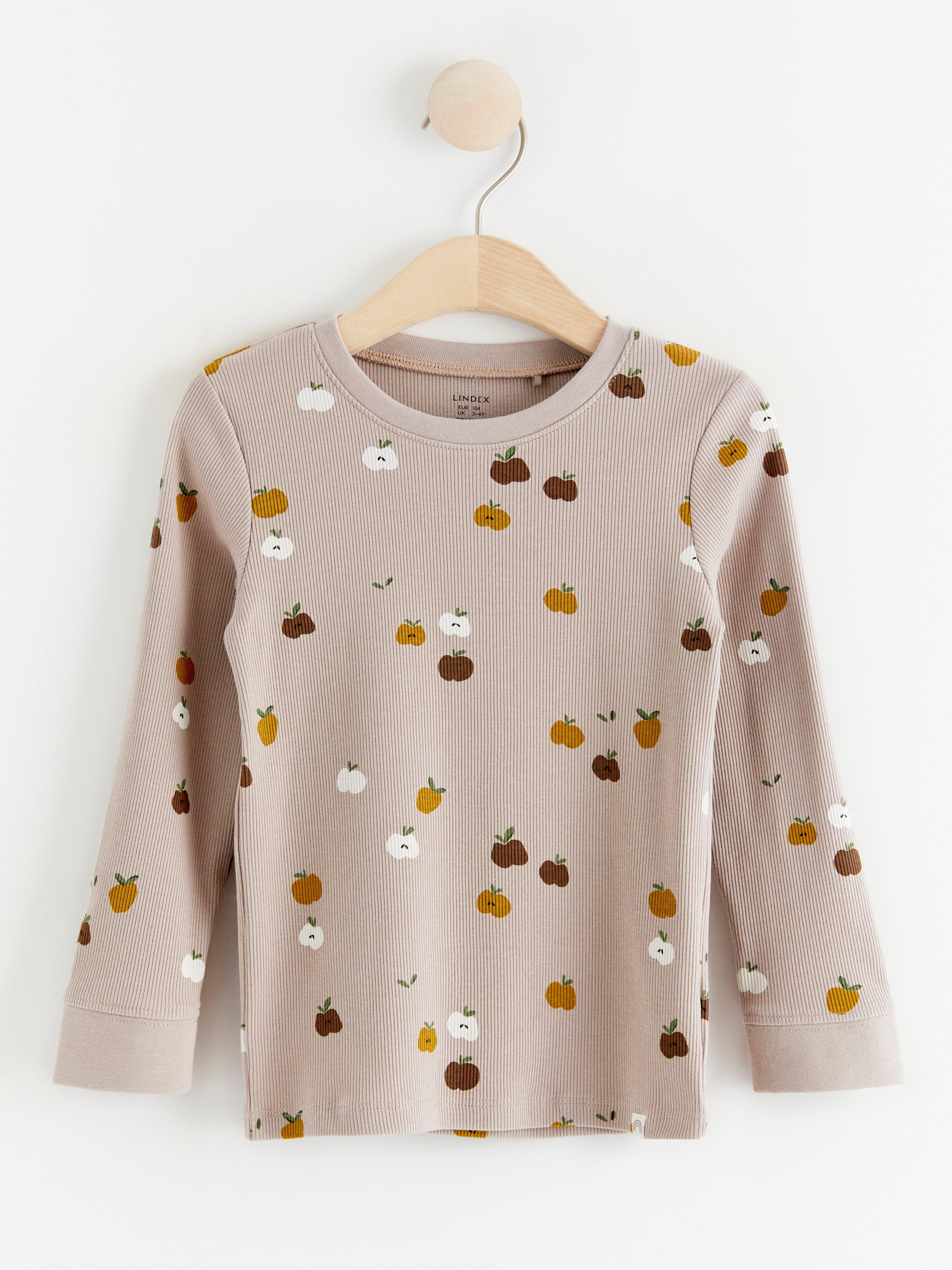 Ribbad, långärmad topp med äpple