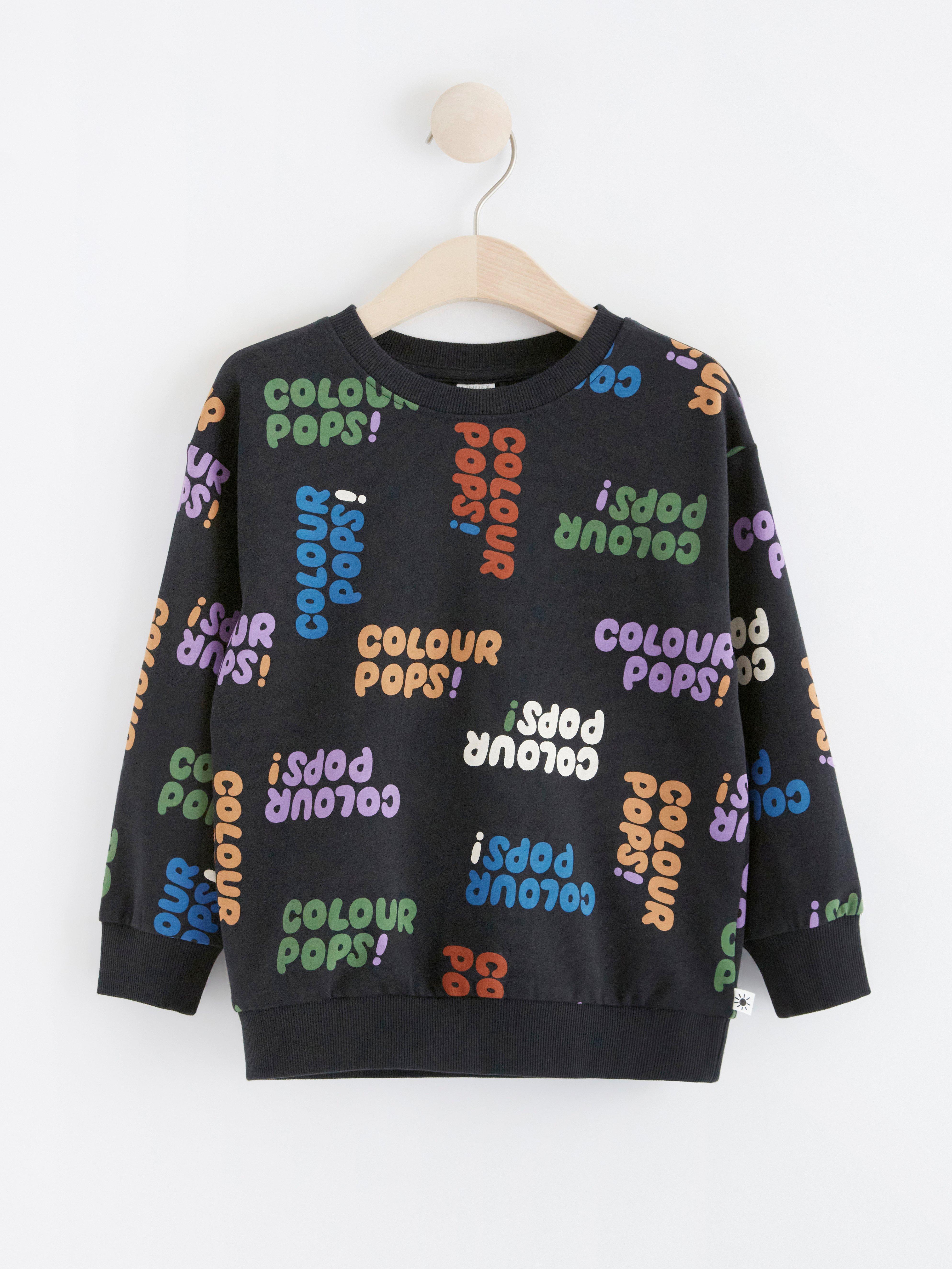 Prodloužená mikina s nápisem