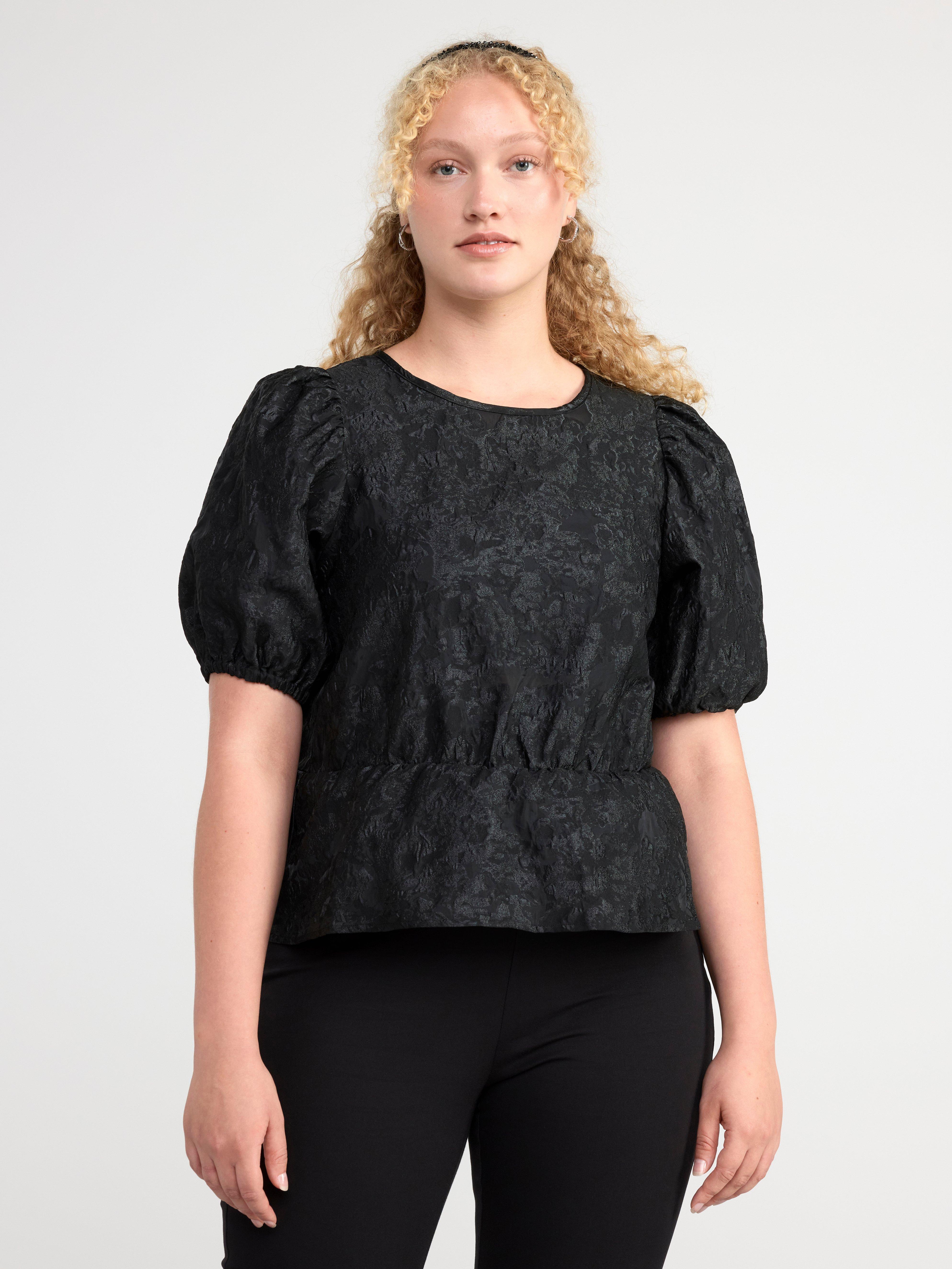 Blus i jacquard med puffärm