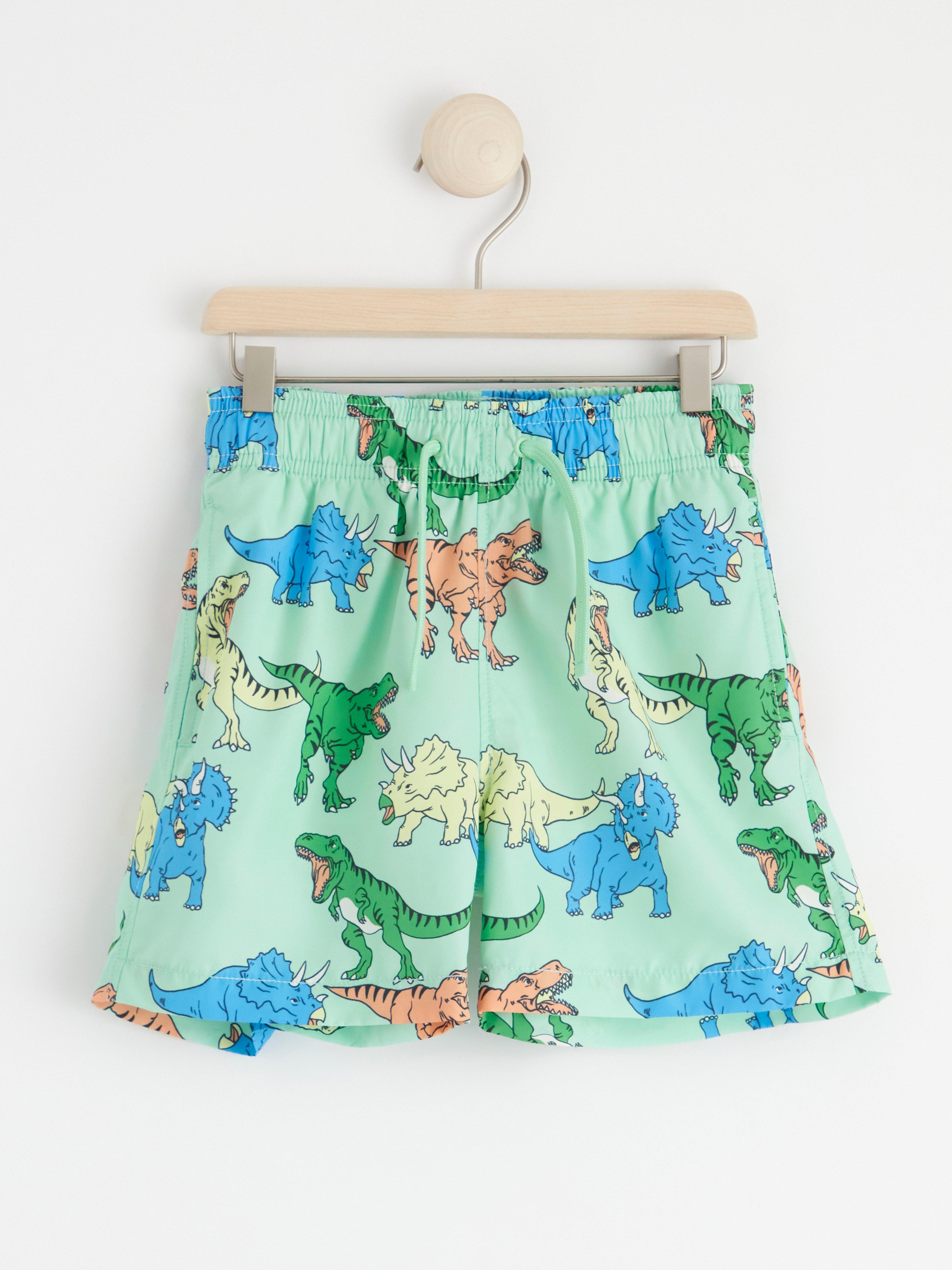 Badshorts med dinosaurier