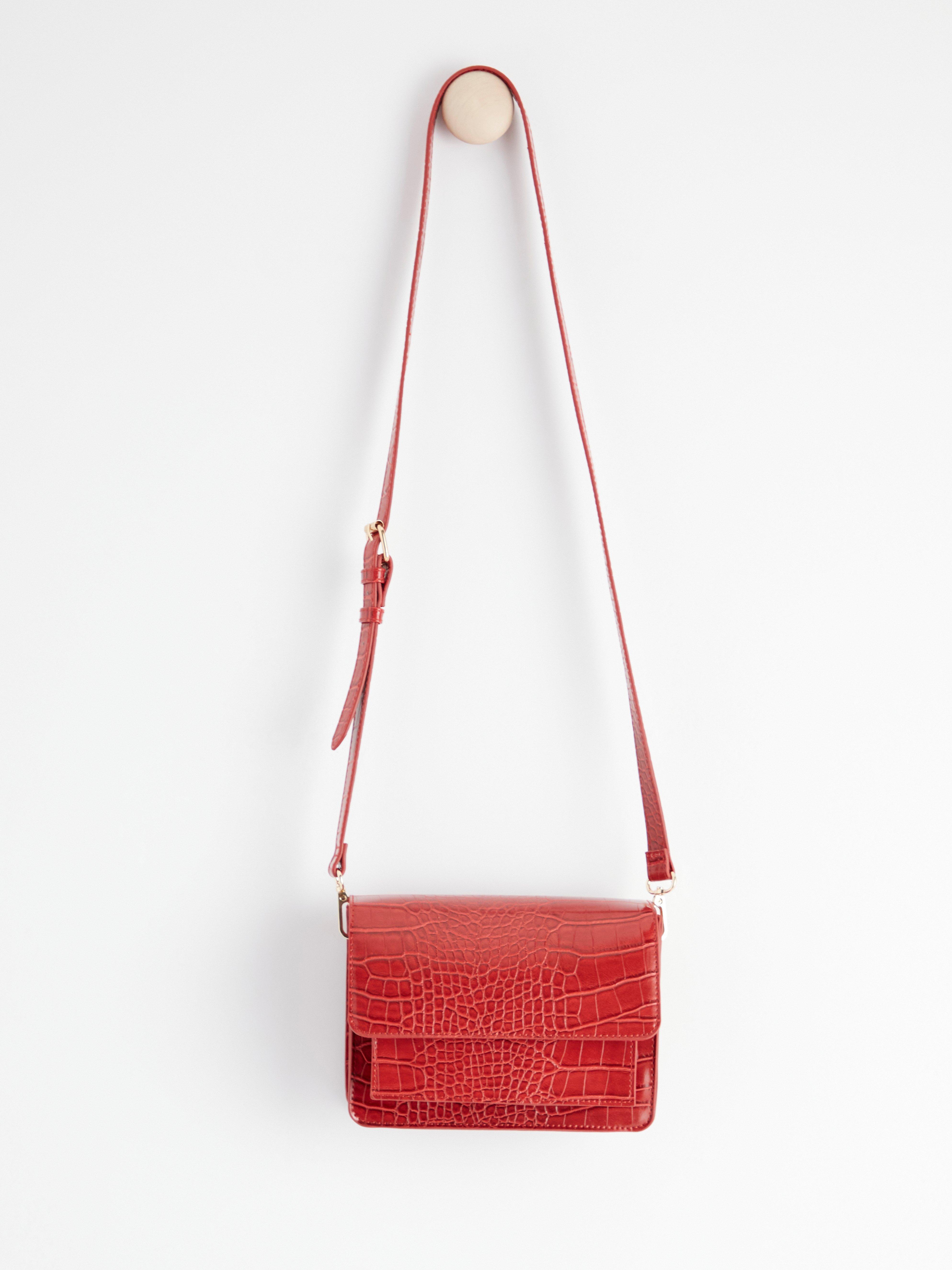 red leather shoulder handbag