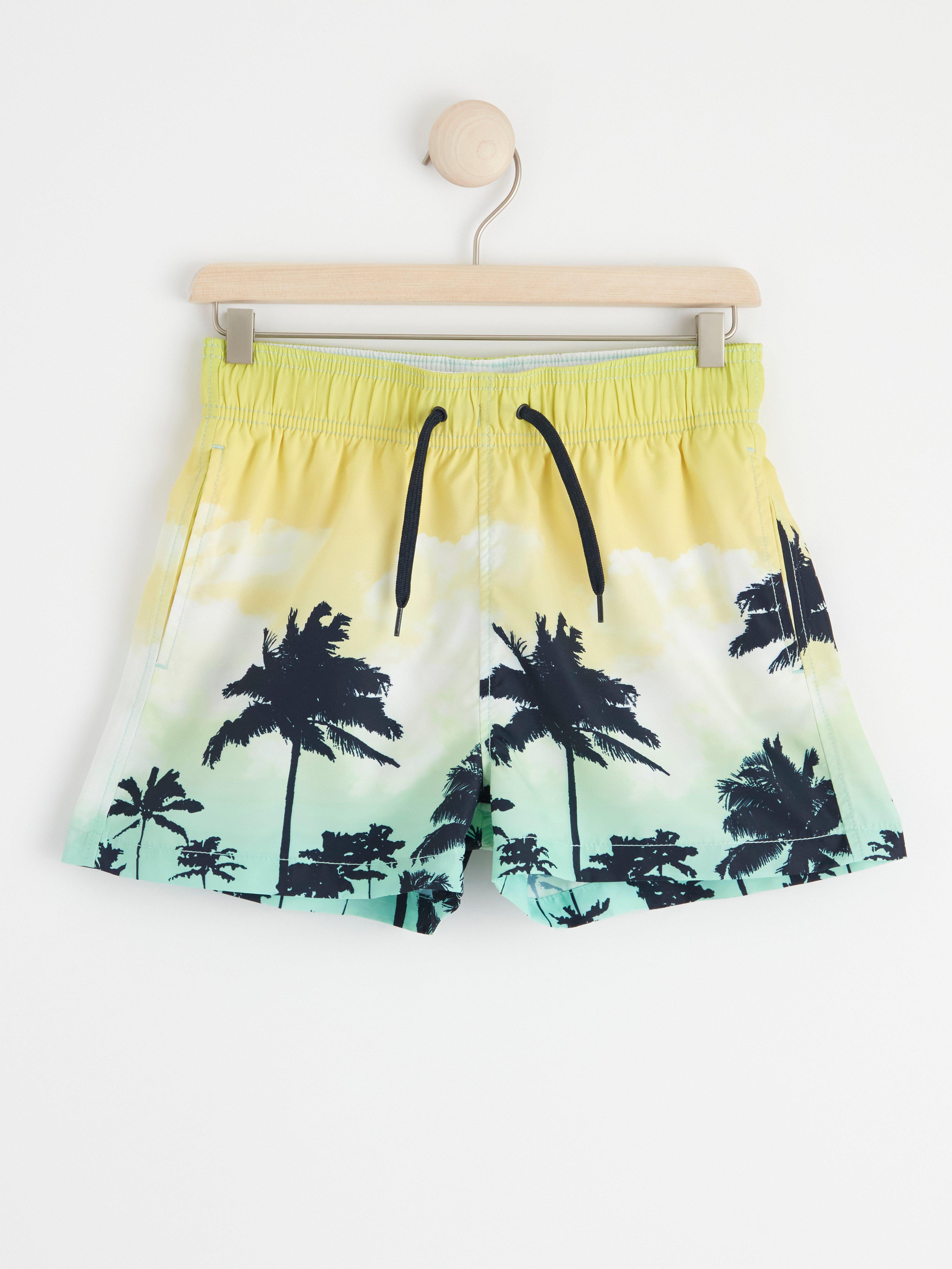 Badshorts med palmer