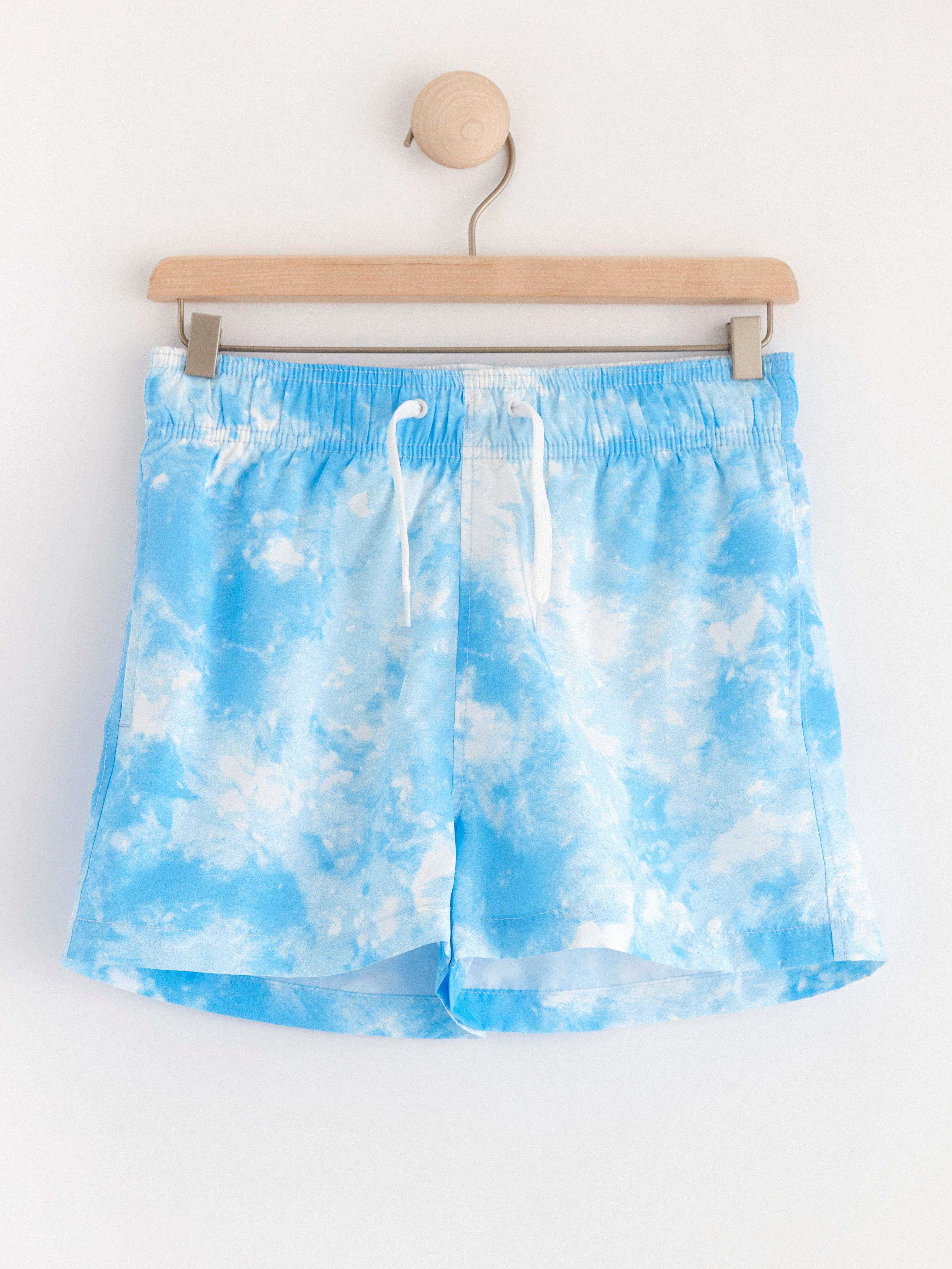 Badshorts med batikmönster