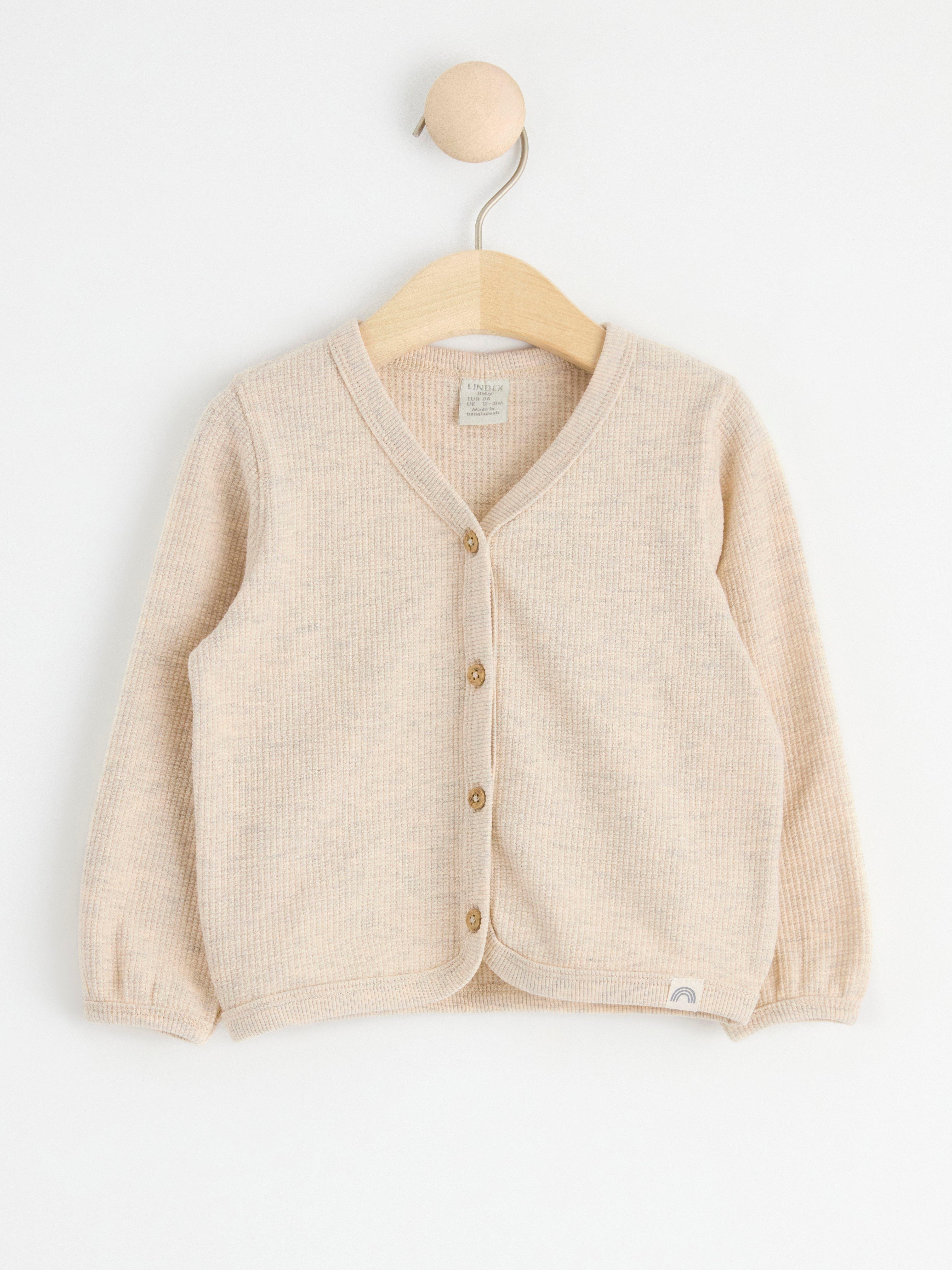 Våfflad cardigan i trikå