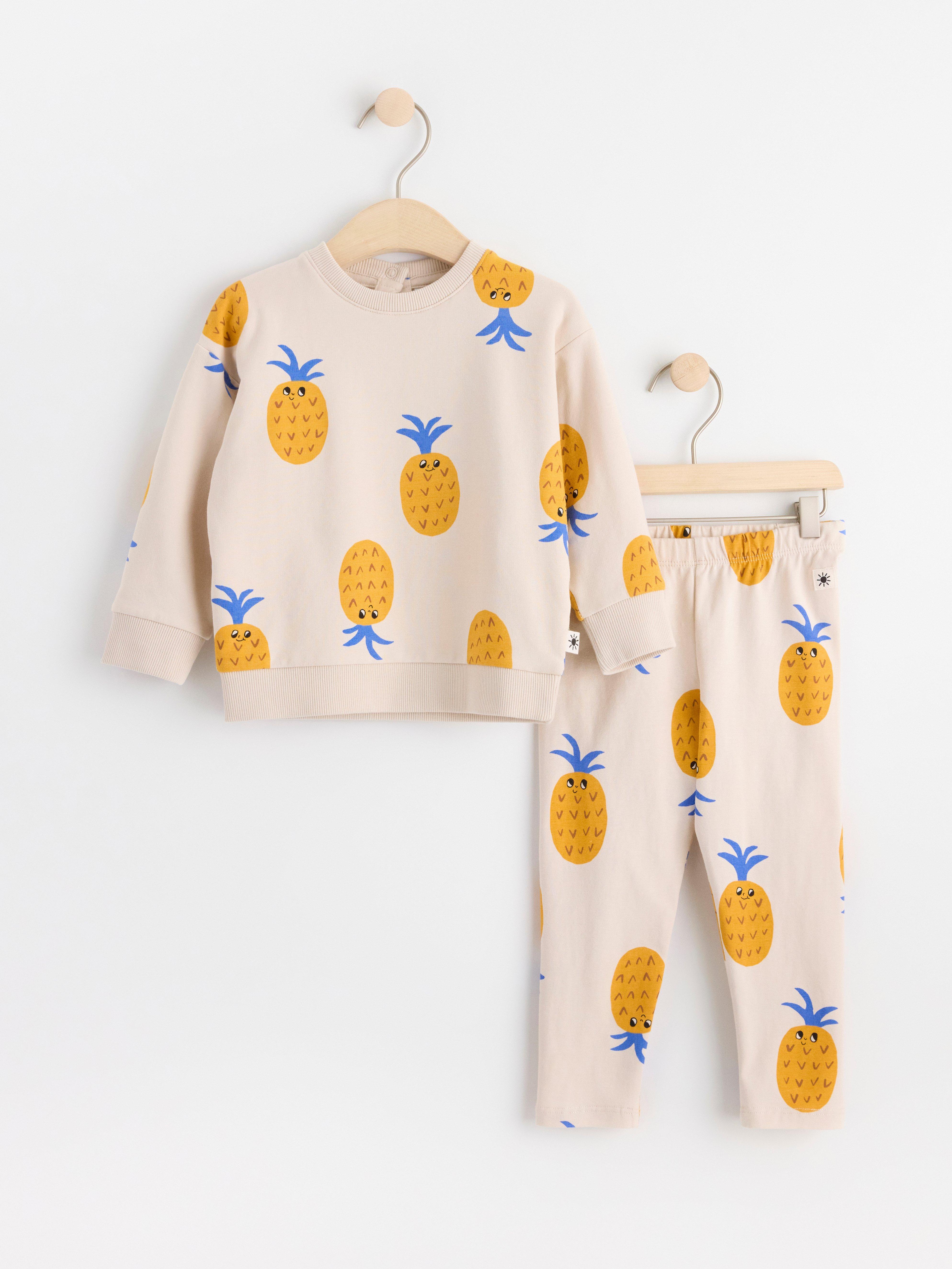 Set med sweatshirt och leggings med ananaser