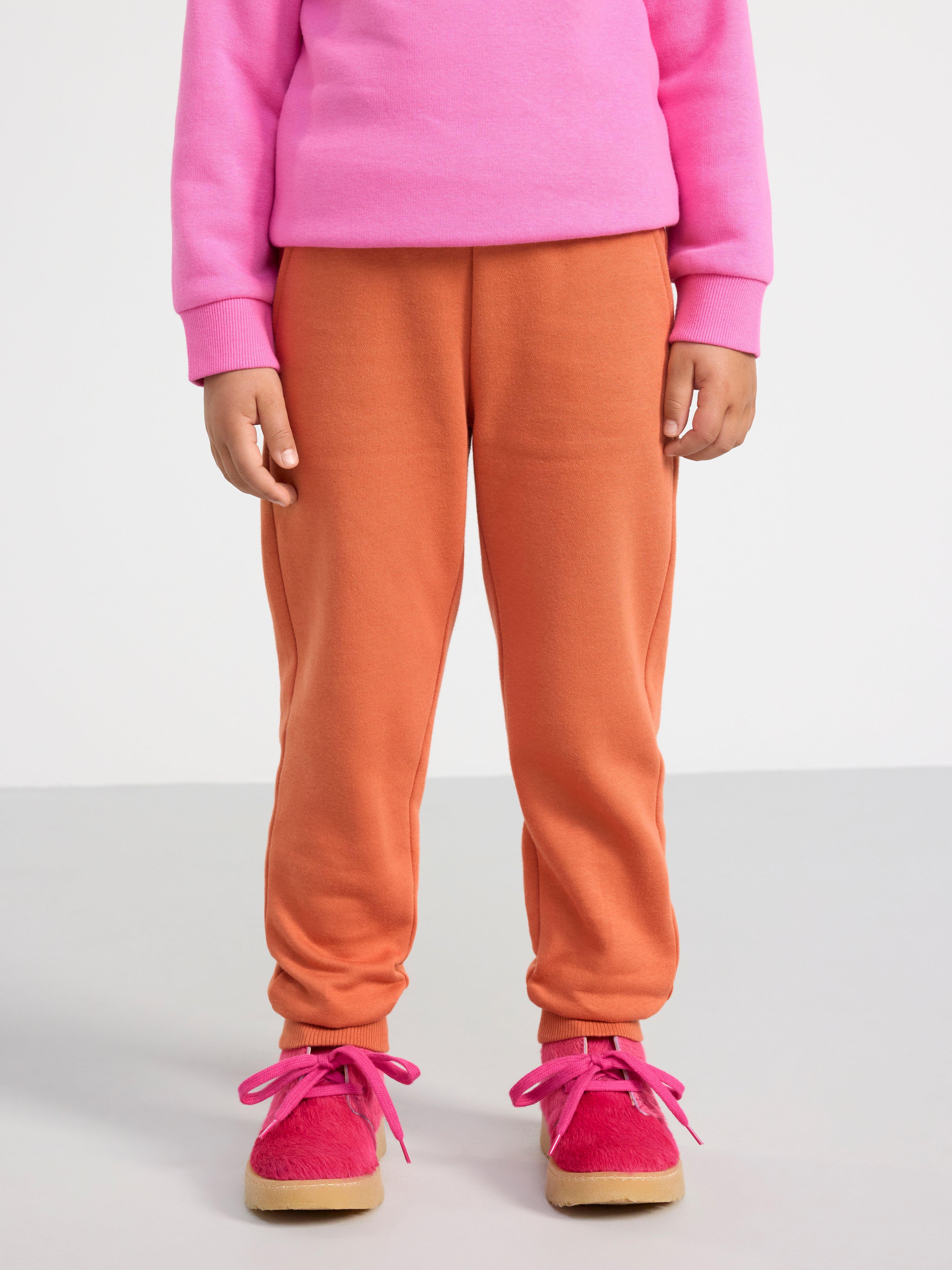 Orange store joggers kids