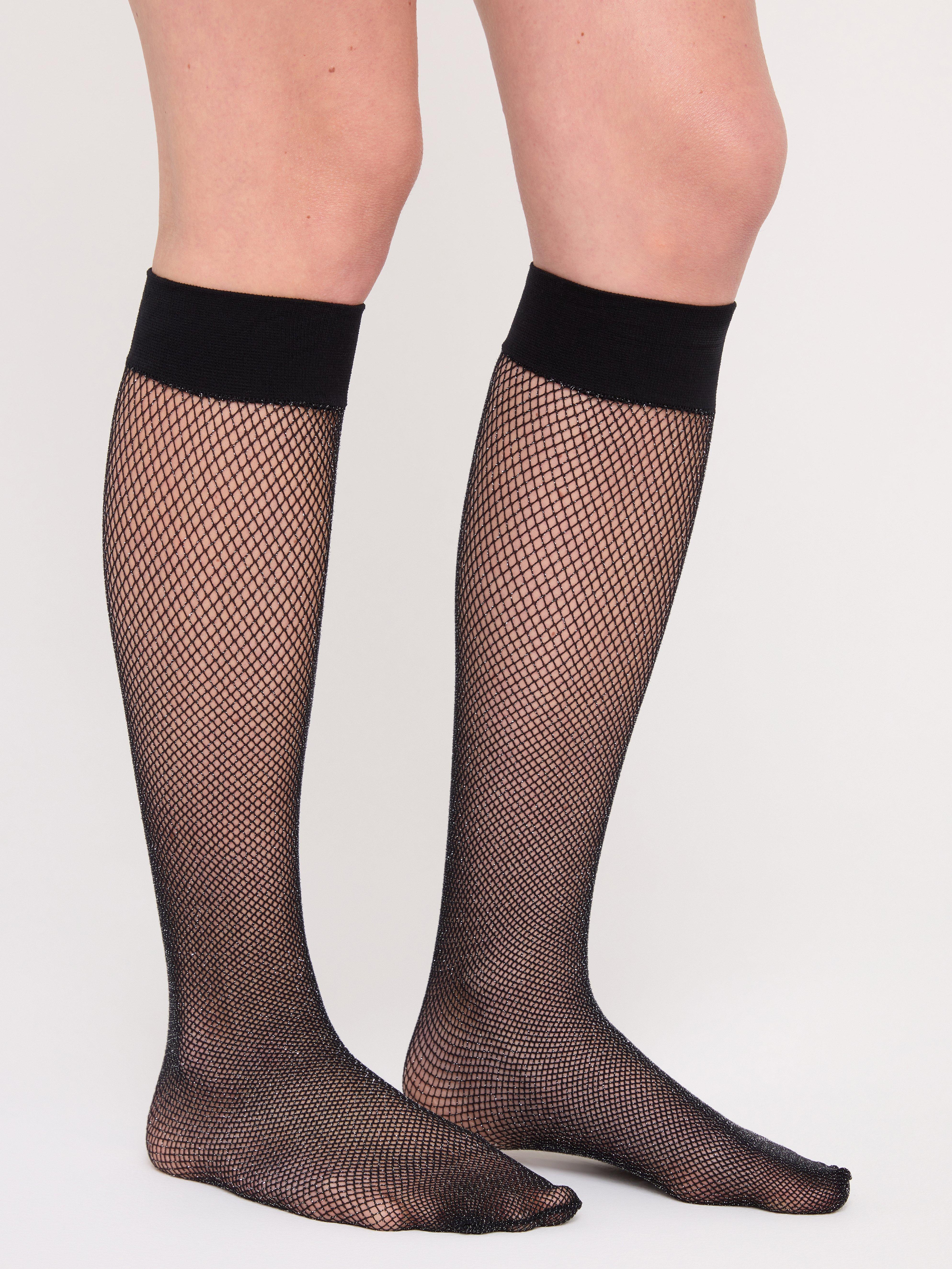 Fishnet tights with knee high outlet socks