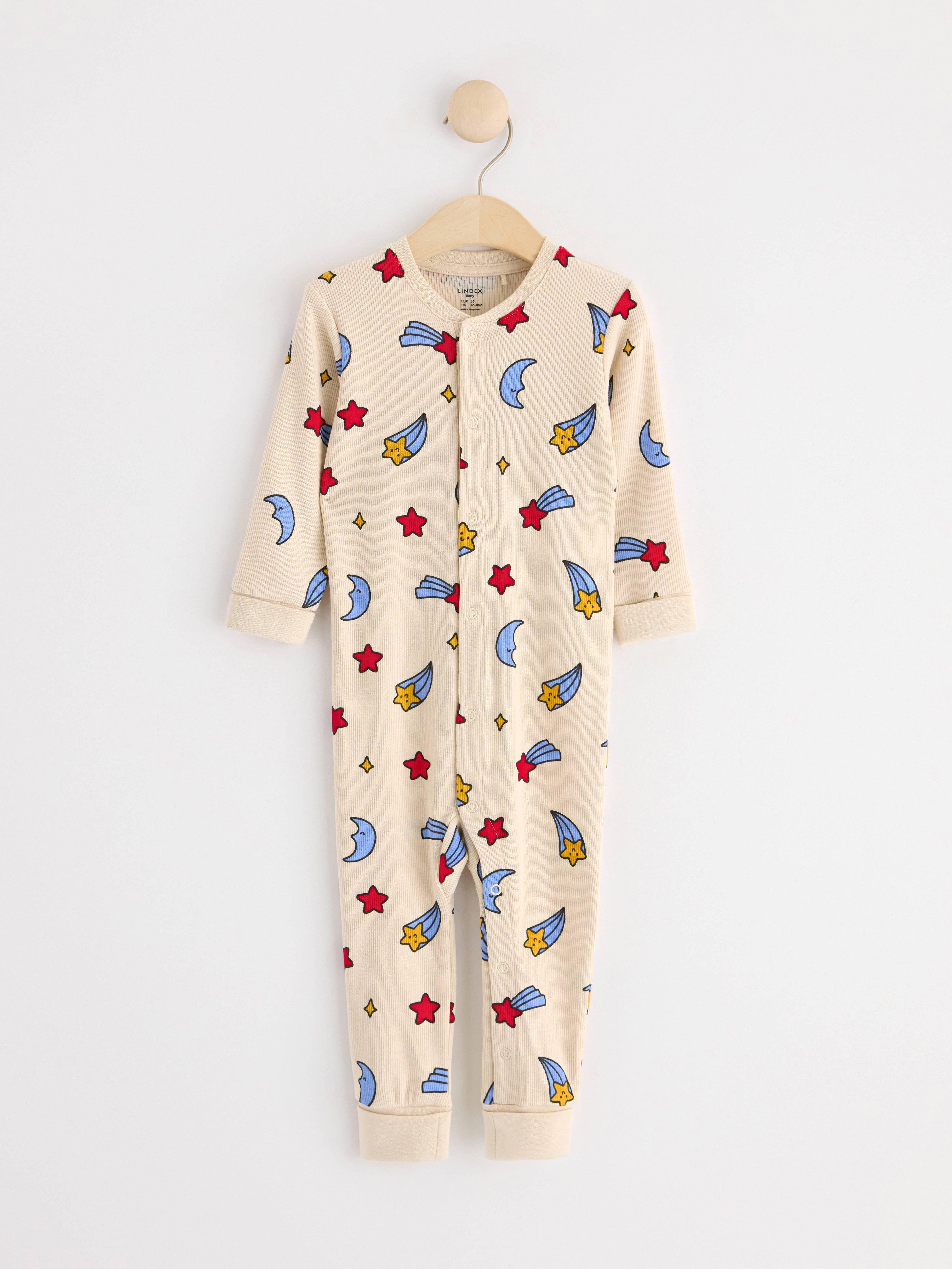 Onesie med heltäckande mönster