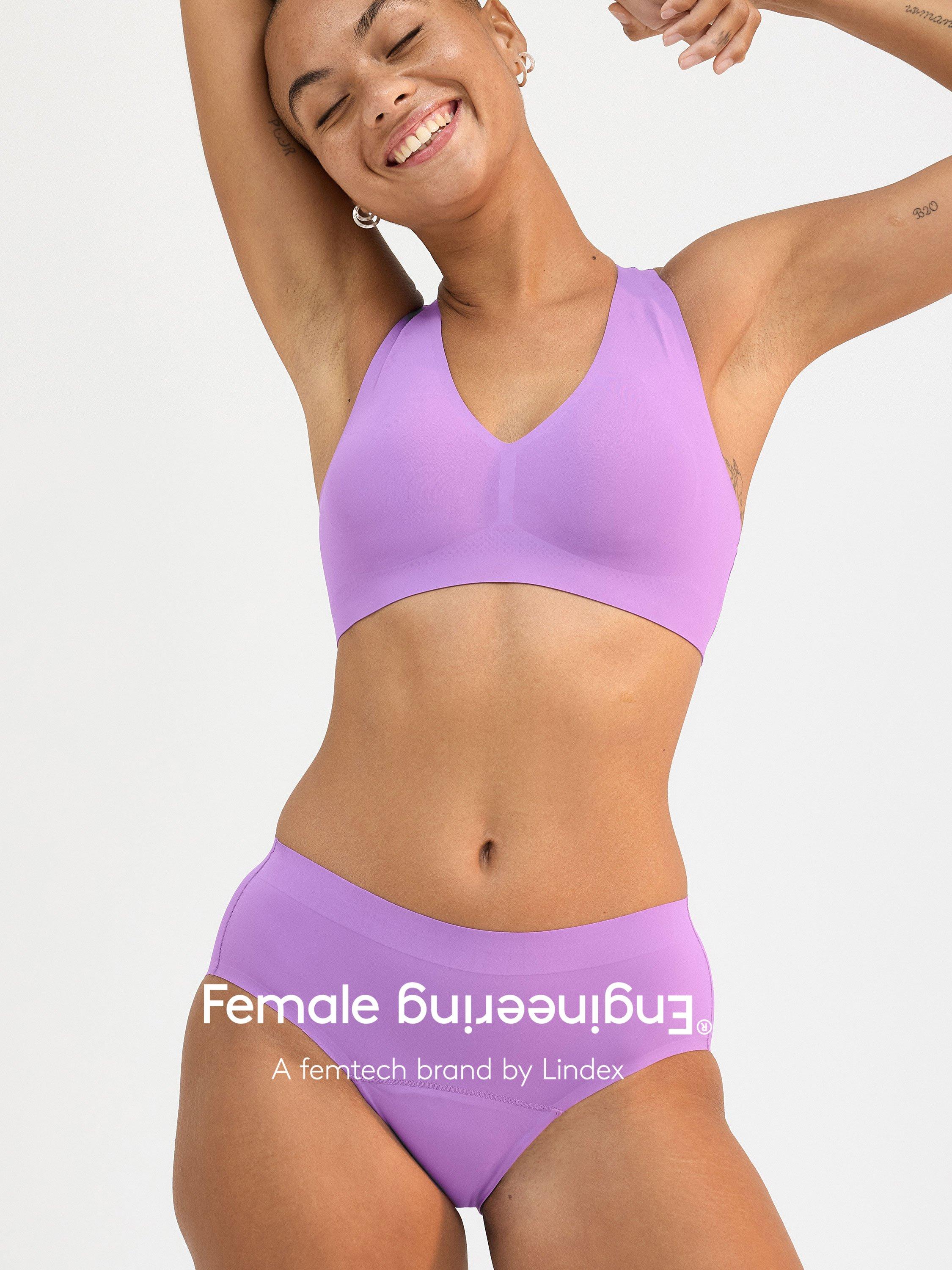 A woman i a pair of period-proof panty from Female Engineering with their logo.